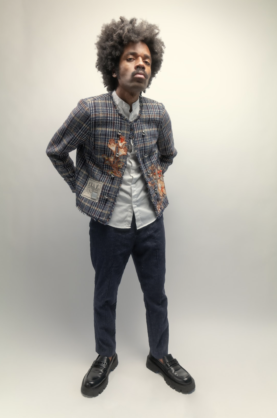 Pre-loved, upcycled patterned formal jacket, hand-appliquéed + beaded by Ela é. Diferente