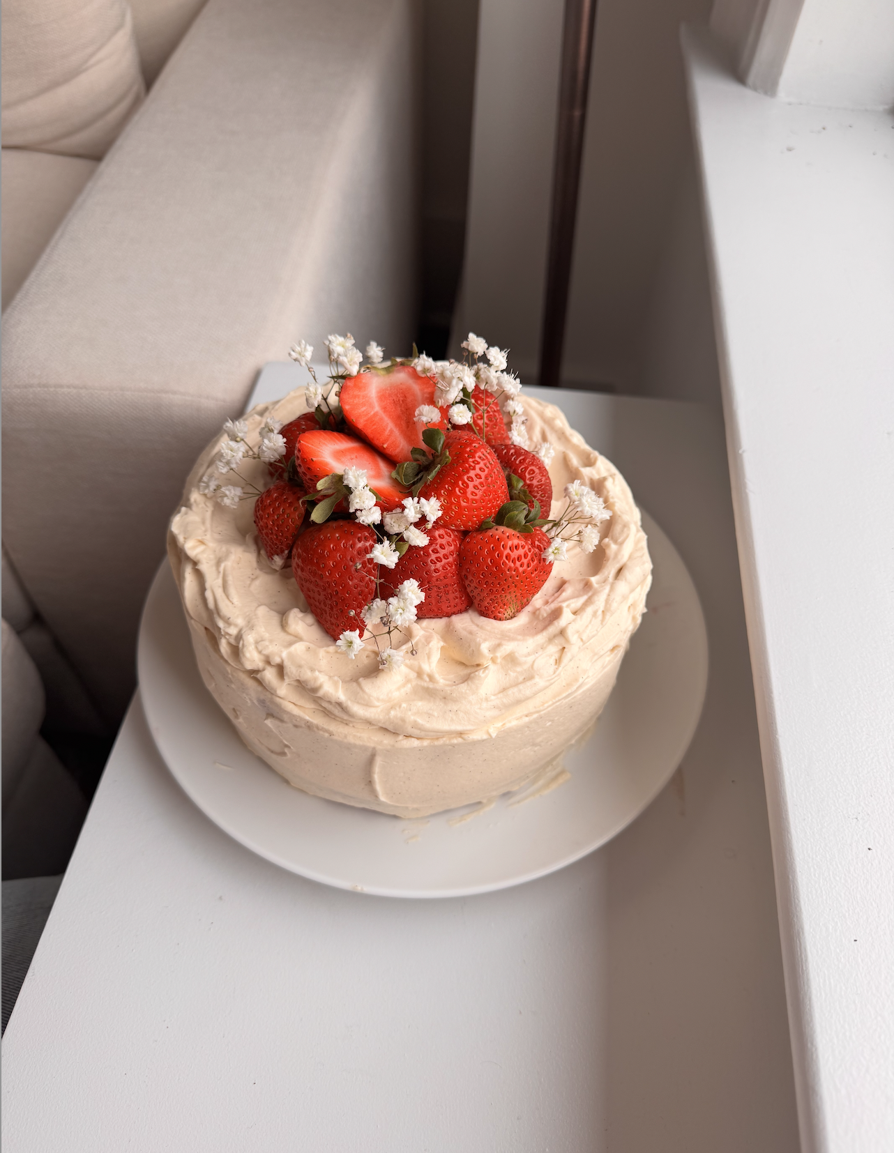 My boyfriend's 24th birthday cake! Inspired by his love of strawberry shortcake, I made a vanilla cake, with a fresh strawberry filling in between the layers, and a whipped vanilla cream ganache.