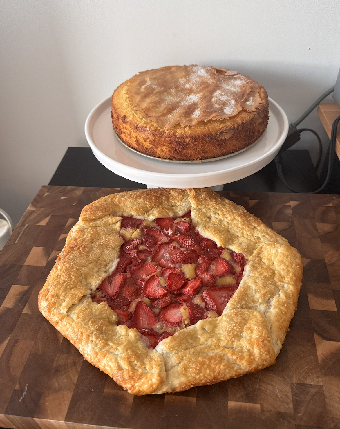 Strawberry and frangipane galette (I paid for my first-ever Substack subscription to get this recipe, lol), and in the back, a simple olive oil cake :)