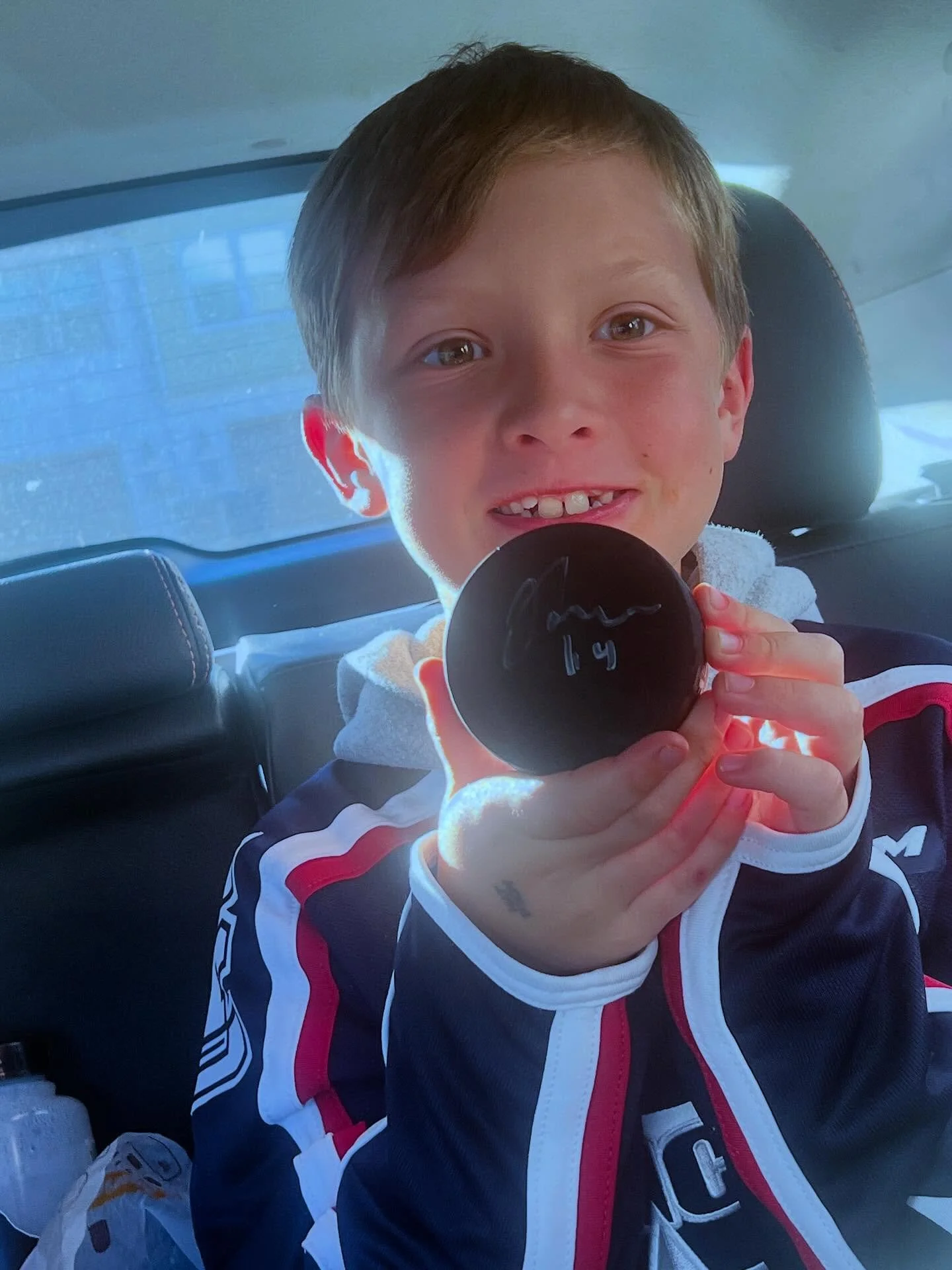 Went to see the @boisestatehockey play @wsu_hockey_ this afternoon. The young man was lucky enough to get a game puck, and then to top it off he got it signed. Big shout out to @jhowell_24 for making this dude&rsquo;s day!