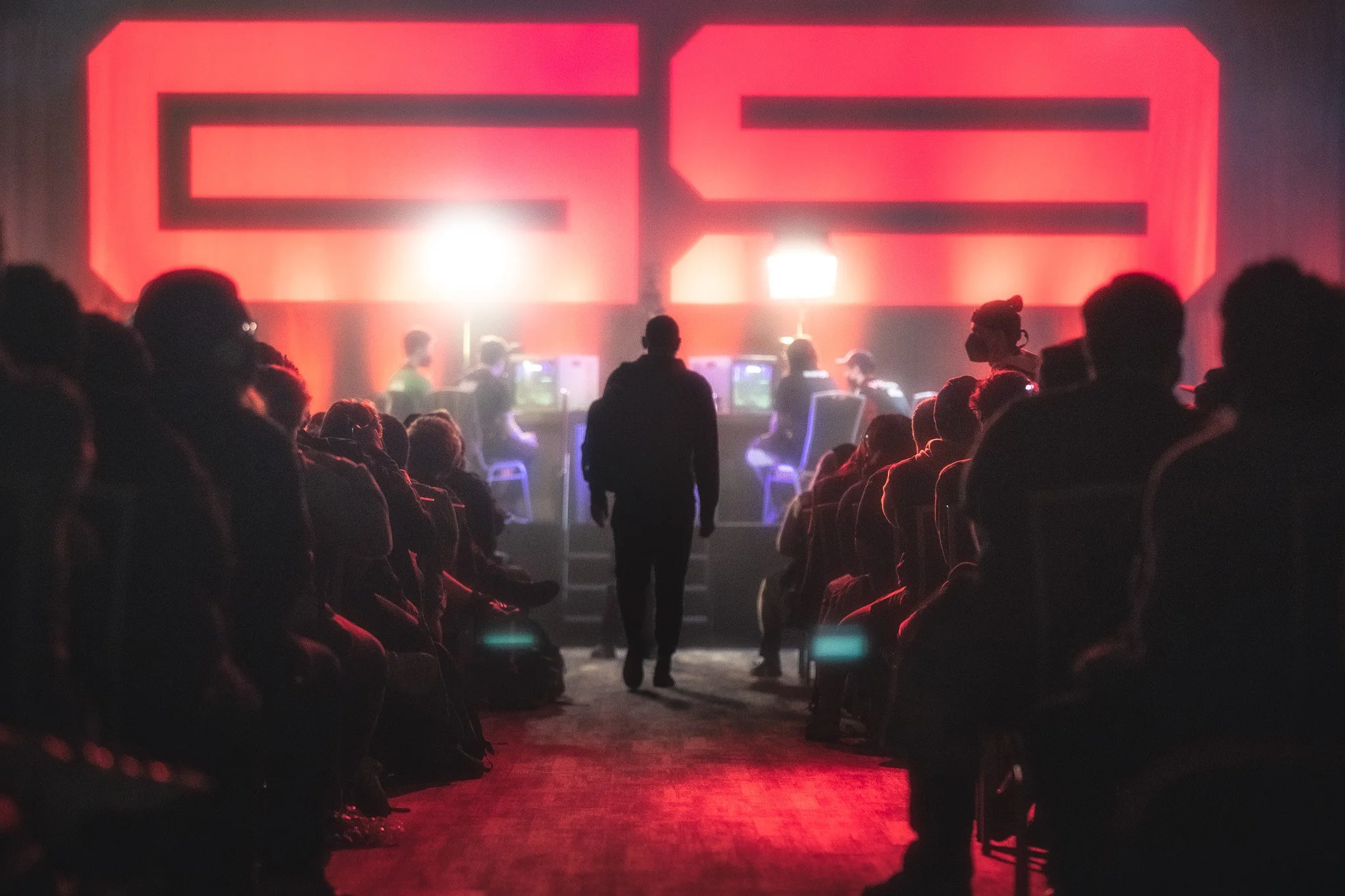 Man walks through the crowd at Genesis 9 during Melee doubles grand finals