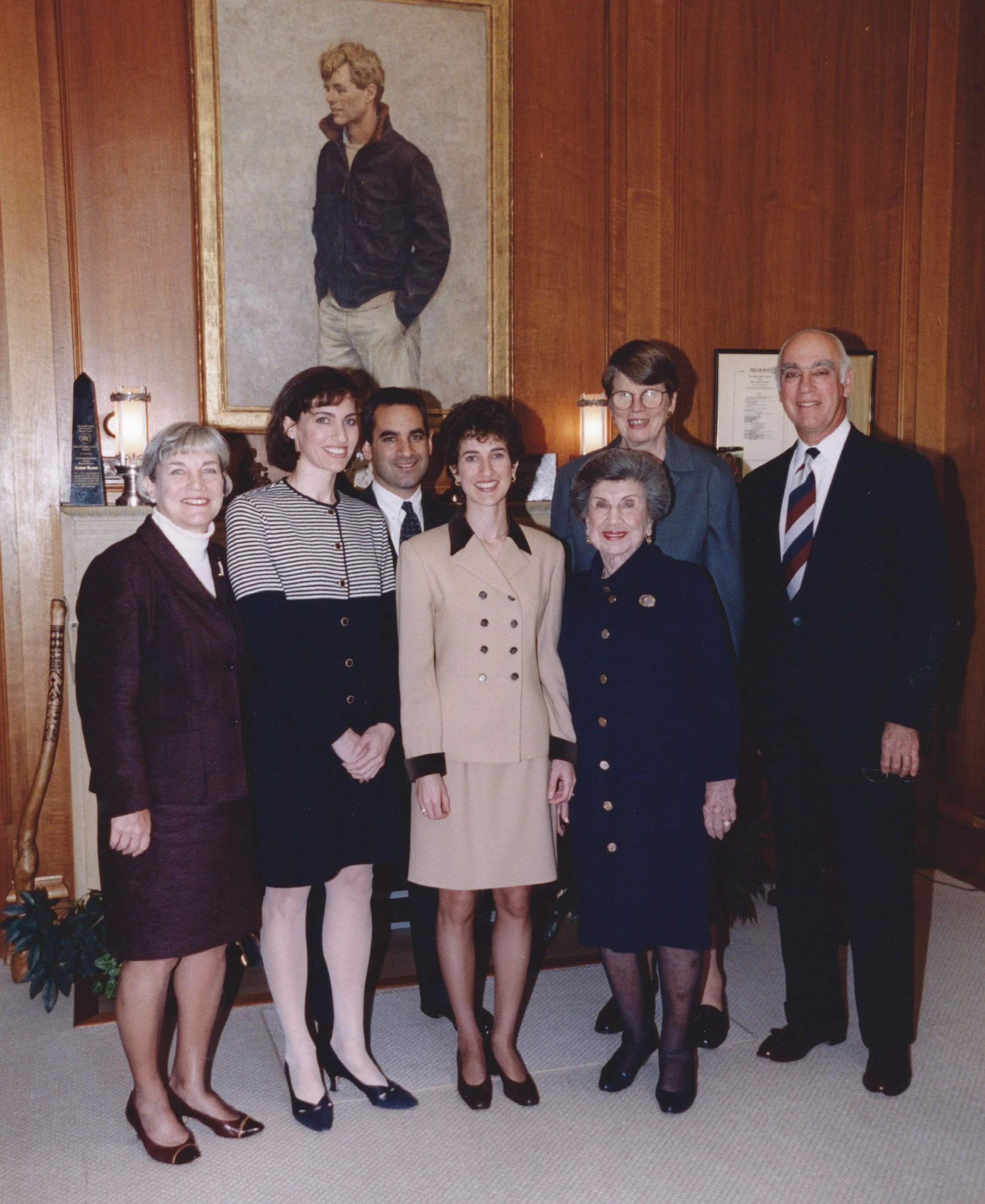 Kinney and her family with AG Janet Reno in the Office of the Attorney General