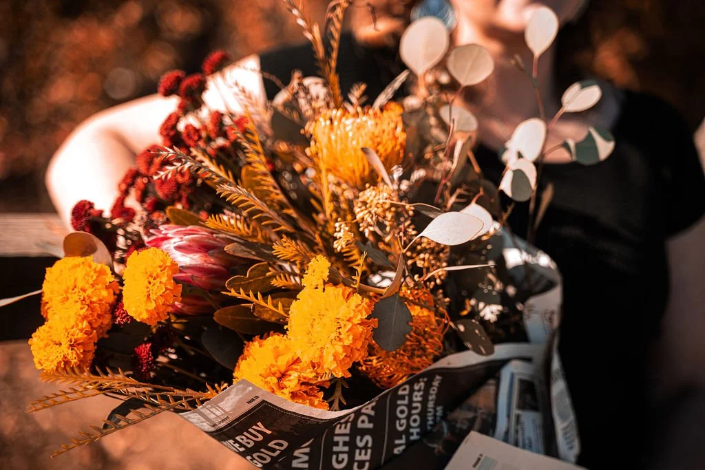 Closeup shot of fall colored flower bouquet