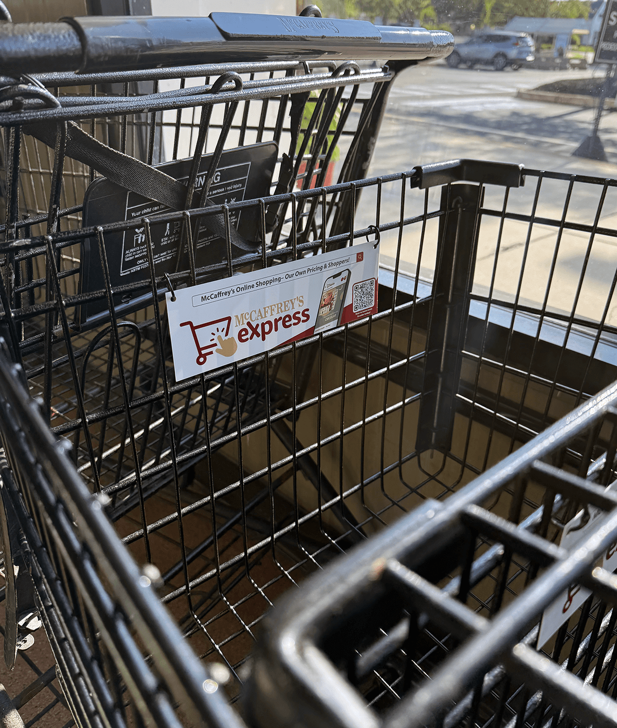 Sign on back of cart for McCaffrey's Express