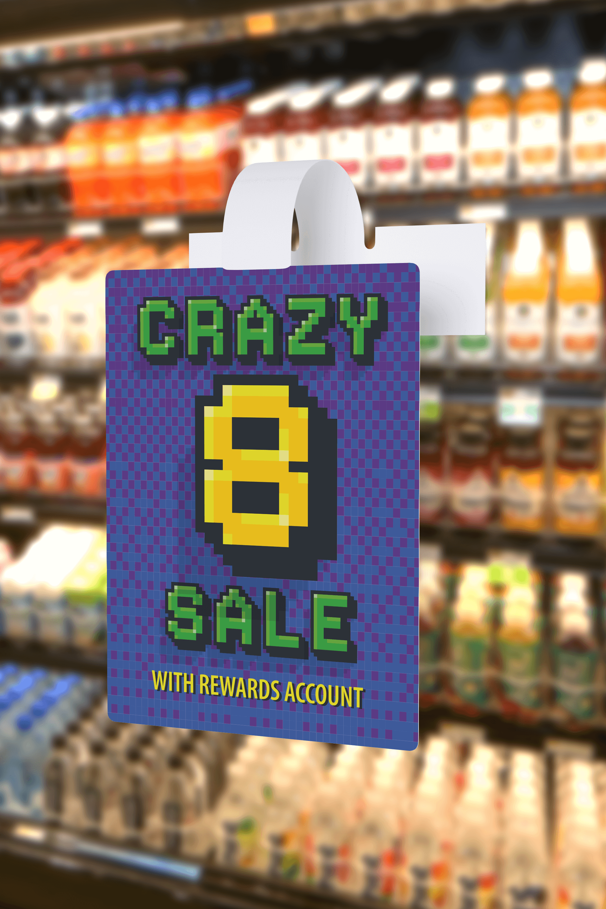 Mockup of McCaffrey's crazy 8 sale tag wobbler on a blurred background of retail shelves containing drinks
