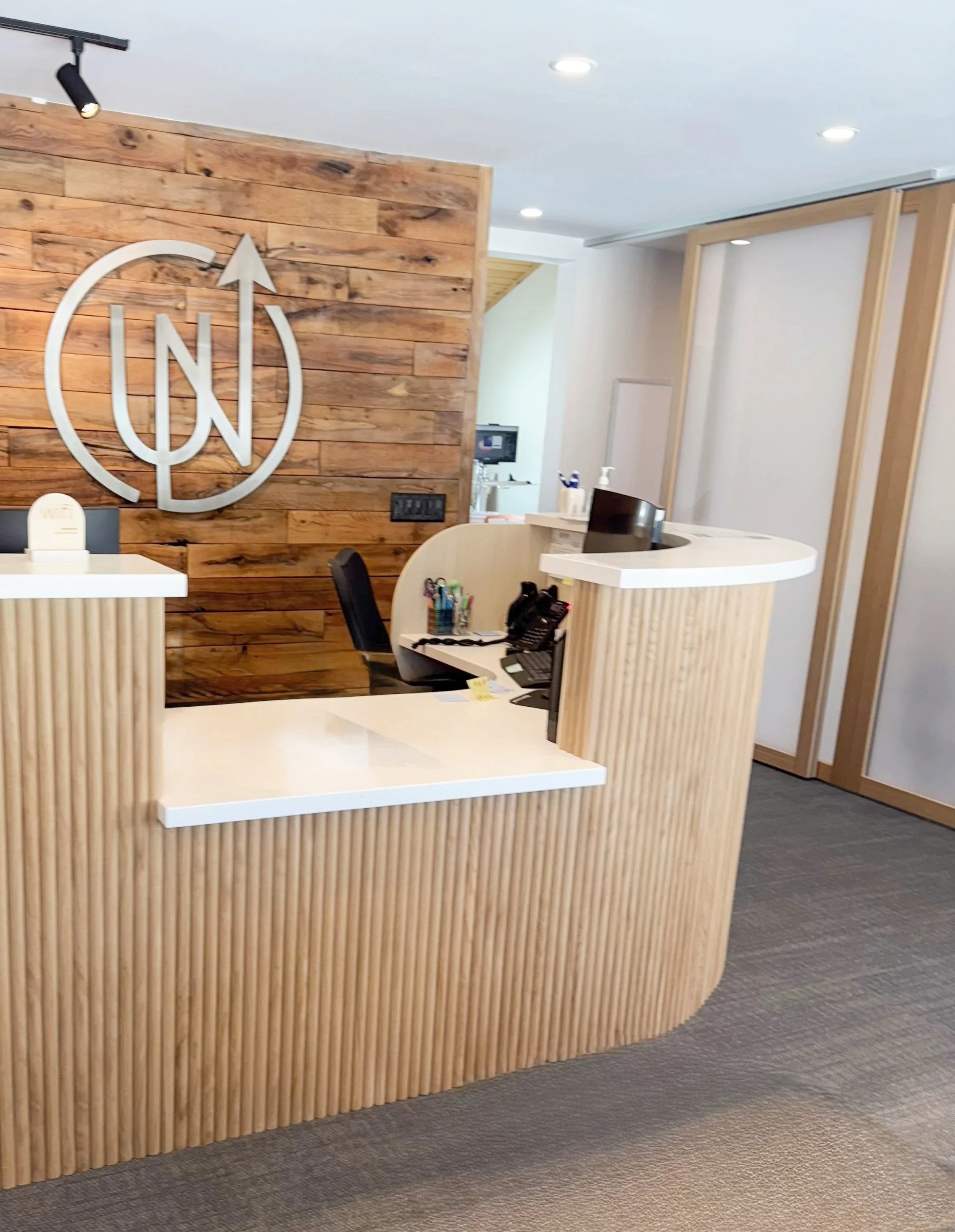 Custom reception desk at orthodontic practice in Northern Michigan