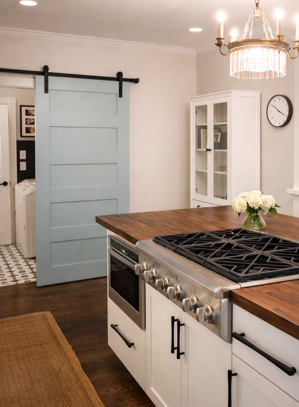 Remodeled kitchen featuring butcher block island and fresh colors mixing industrial touches with historical home