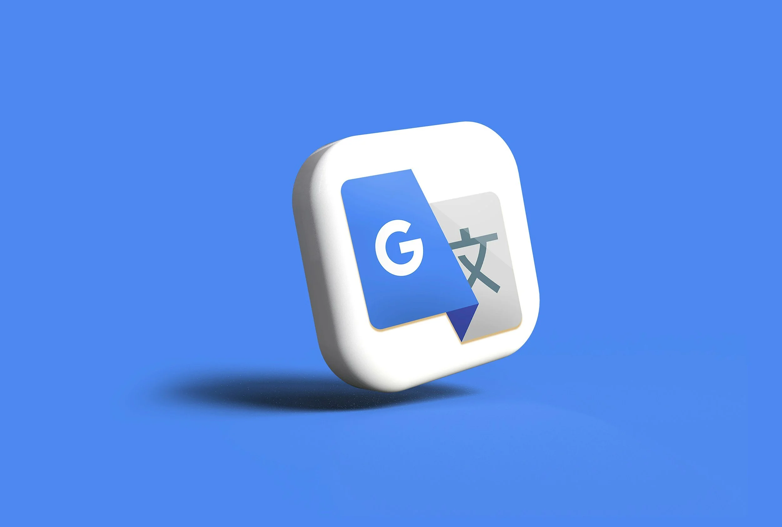 Icon for Google Translate app with a blue and gray speech bubble and the G logo on a blue background.