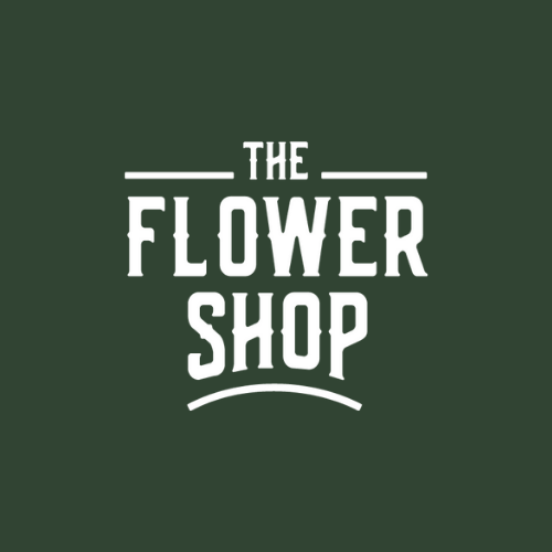 Logo for The Flower Shop in white text on a dark green background.