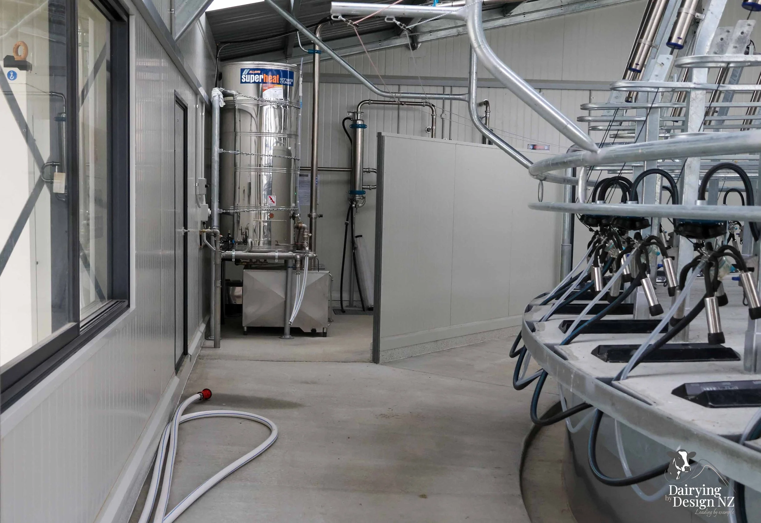  Canterbury rotary dairy shed development designed for efficient milking and cow flow built by Rural Building Solutions, featuring a Donald Engineering Rotary Platform, Earthworks by Densem Contracting 2010 Ltd, Refrigeration by Dairycool, Feed silos