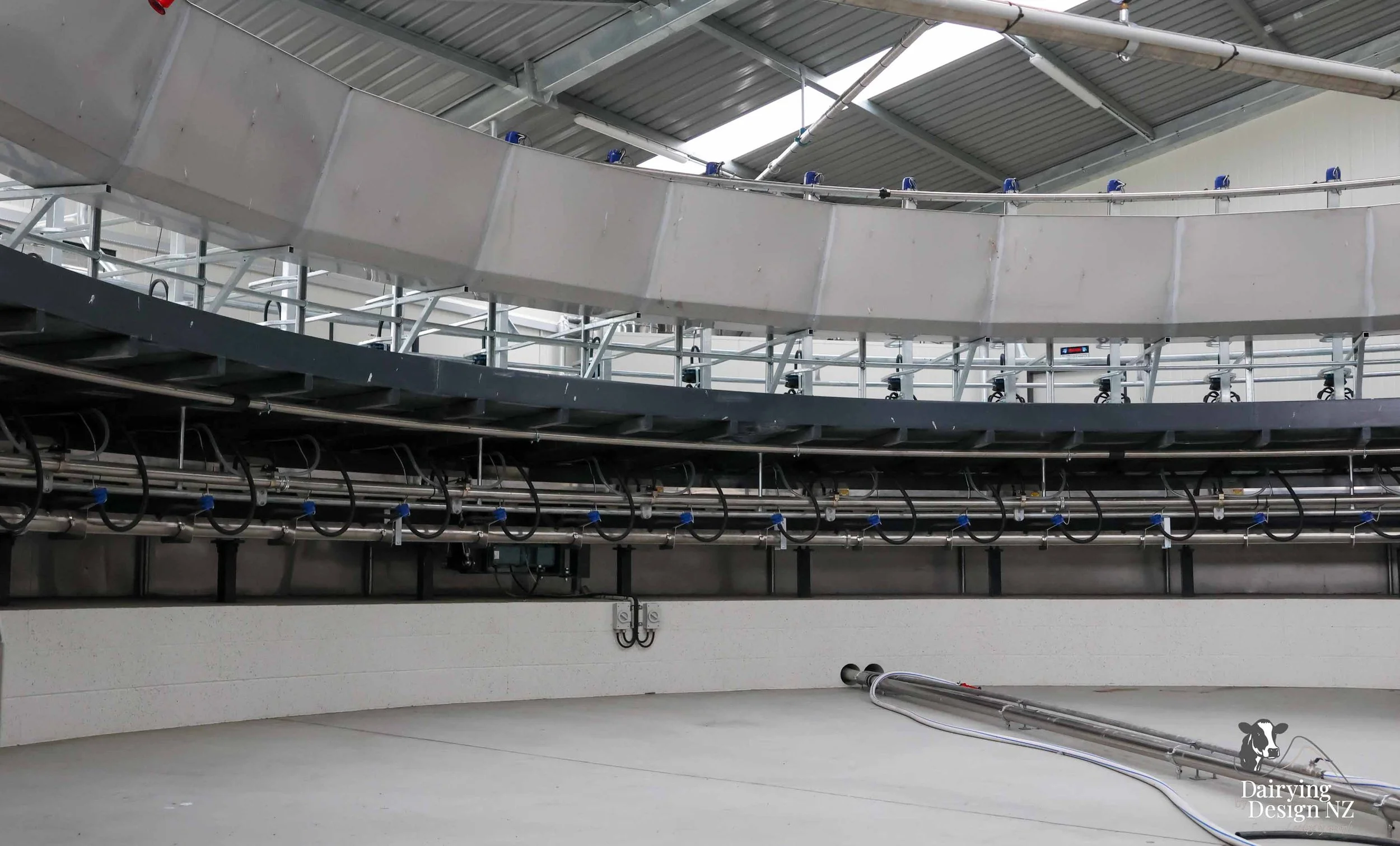  Canterbury rotary dairy shed development designed for efficient milking and cow flow built by Rural Building Solutions, featuring a Donald Engineering Rotary Platform, Earthworks by Densem Contracting 2010 Ltd, Refrigeration by Dairycool, Feed silos