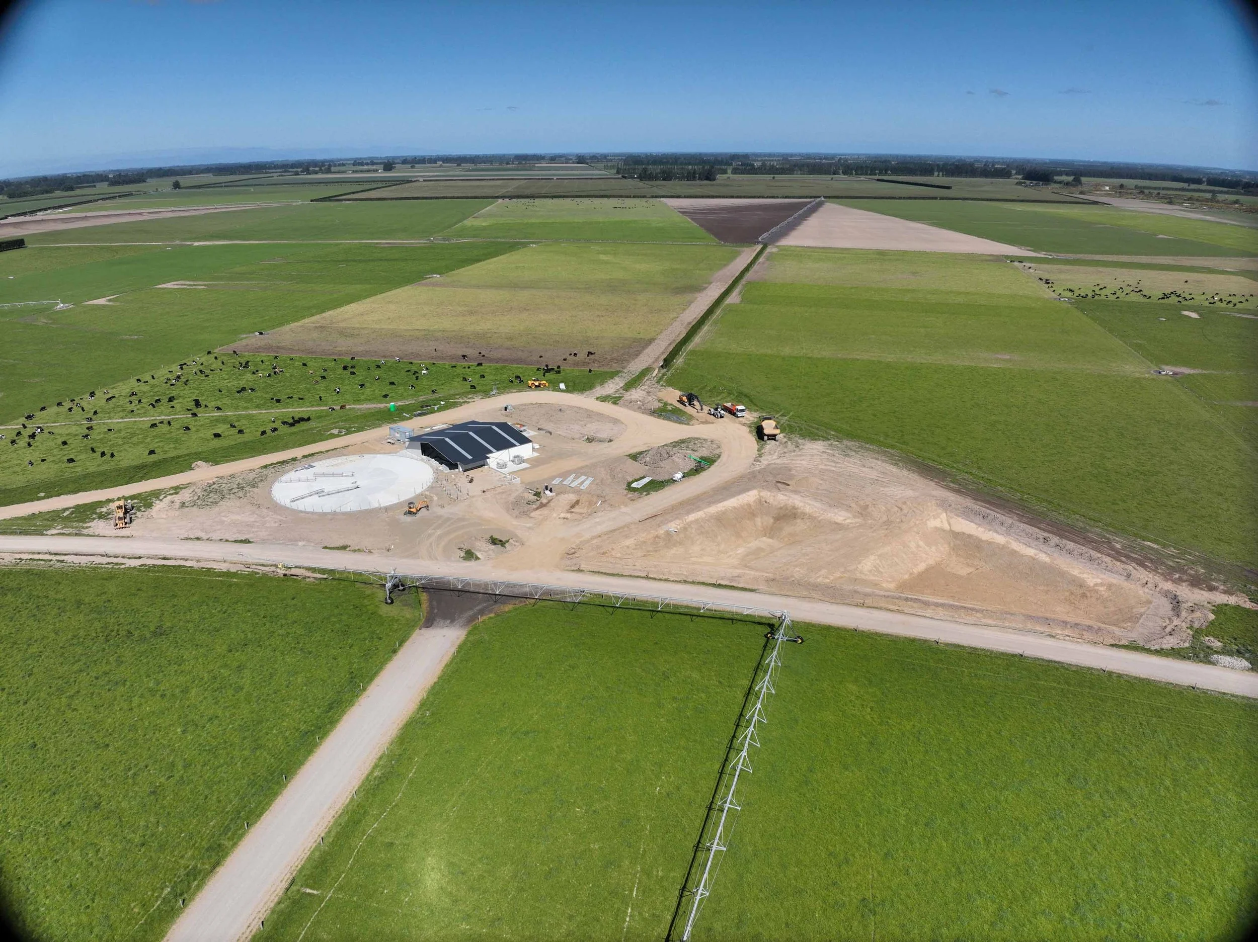  Canterbury rotary dairy shed development designed for efficient milking and cow flow built by Rural Building Solutions, featuring a Donald Engineering Rotary Platform, Earthworks by Densem Contracting 2010 Ltd, Refrigeration by Dairycool, Feed silos