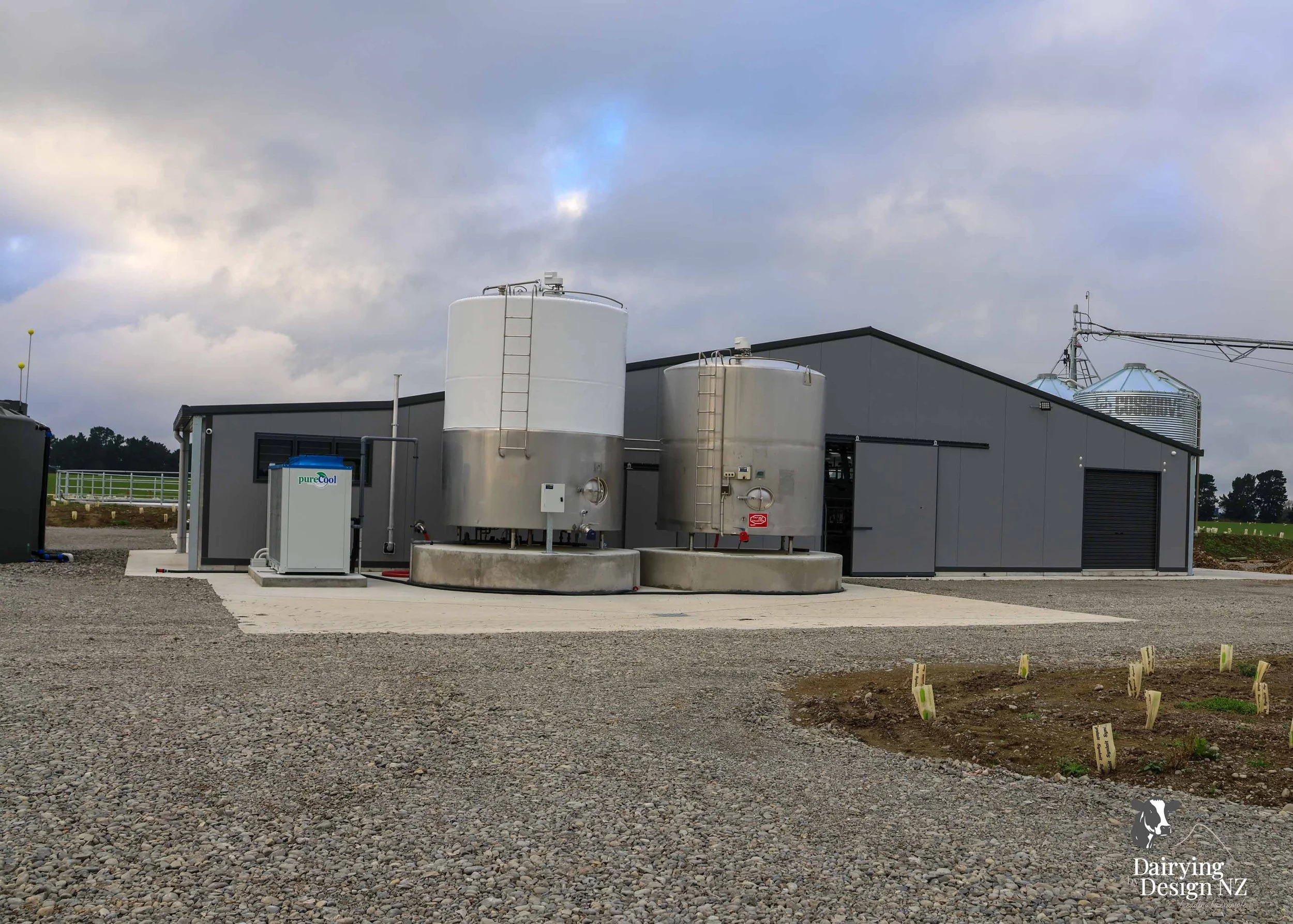 Canterbury rotary dairy shed development designed for efficient milking and cow flow built by Rural Building Solutions, featuring a Donald Engineering Rotary Platform, Earthworks by Densem Contracting 2010 Ltd, Refrigeration by Dairycool, Feed silos