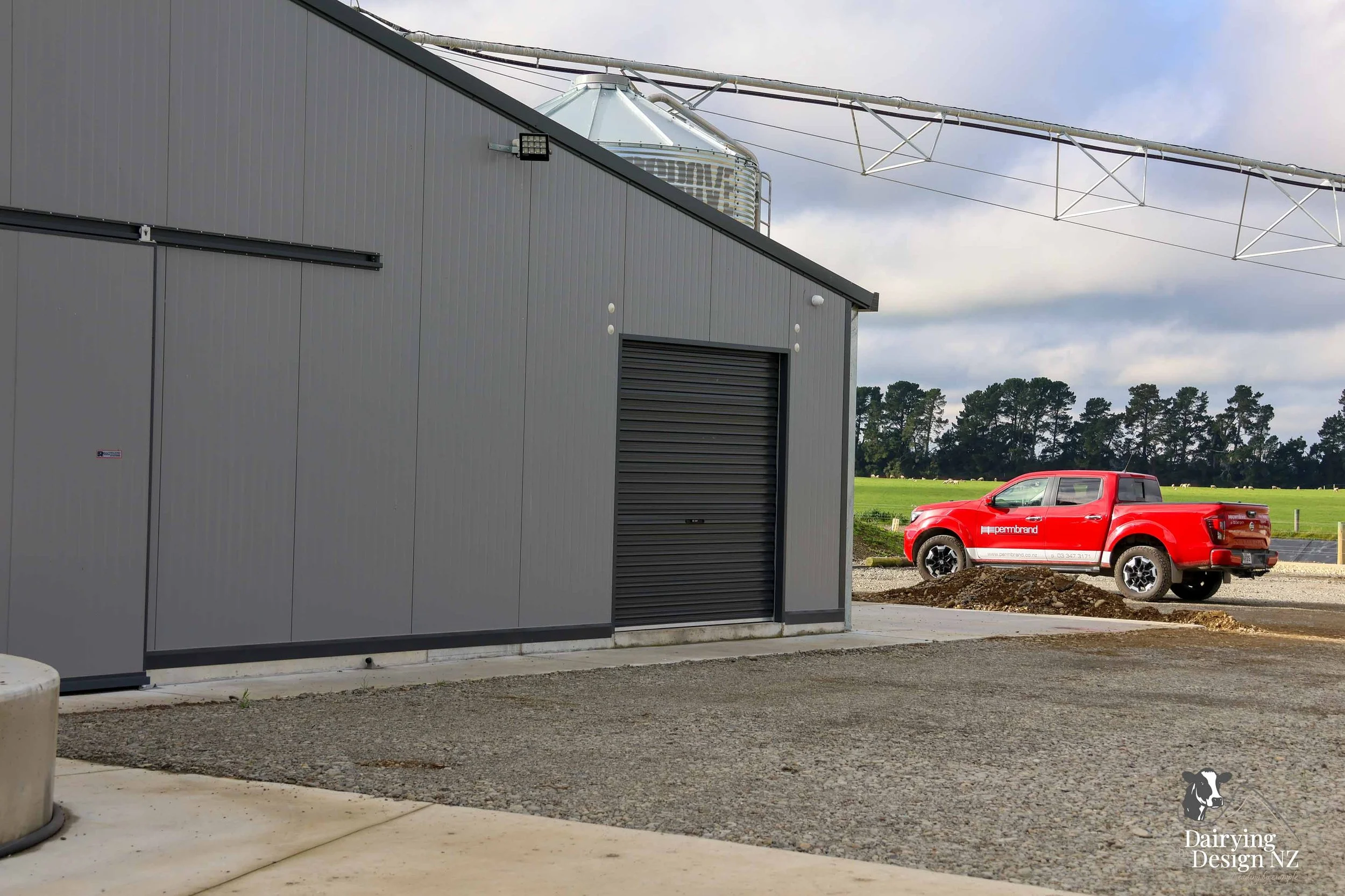  Canterbury rotary dairy shed development designed for efficient milking and cow flow built by Rural Building Solutions, featuring a Donald Engineering Rotary Platform, Earthworks by Densem Contracting 2010 Ltd, Refrigeration by Dairycool, Feed silos