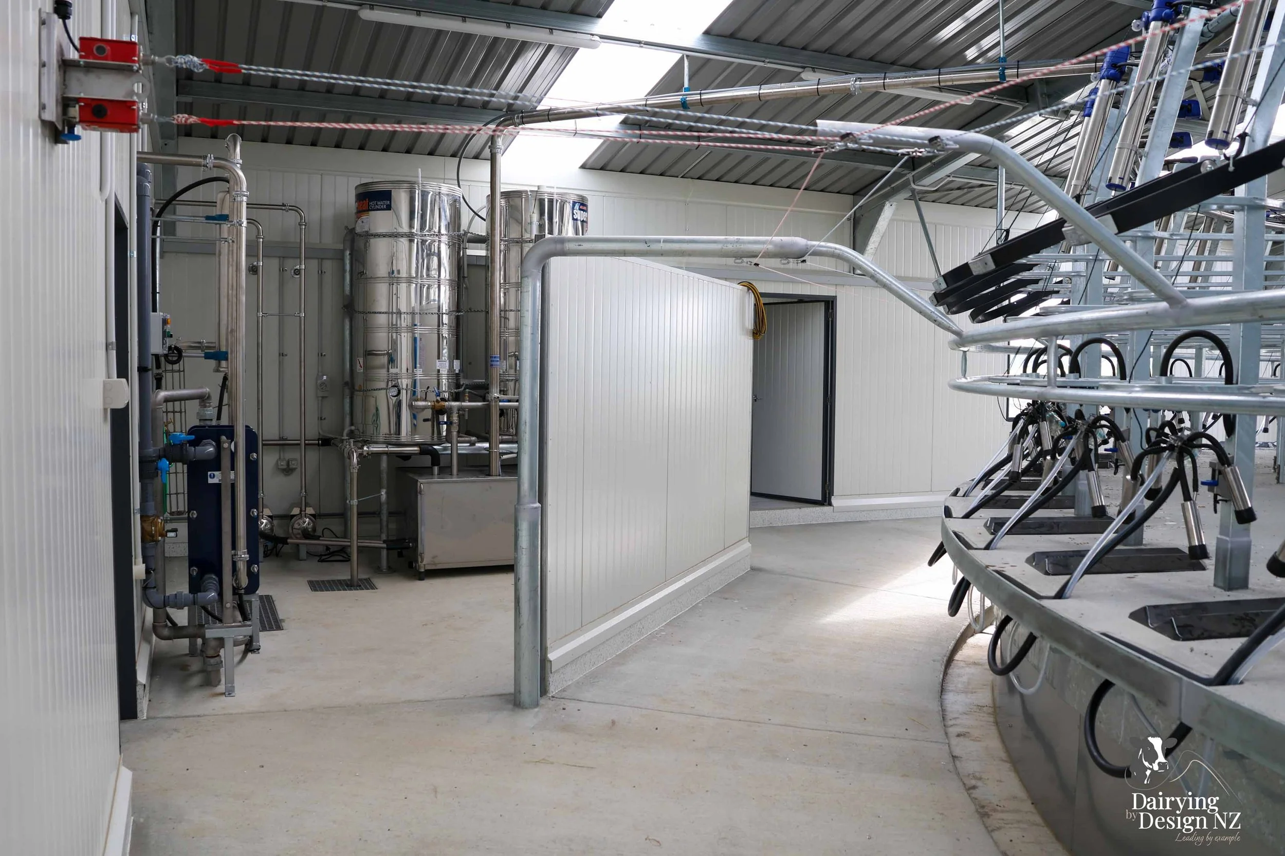  Canterbury rotary dairy shed development designed for efficient milking and cow flow built by Rural Building Solutions, featuring a Donald Engineering Rotary Platform, Earthworks by Densem Contracting 2010 Ltd, Refrigeration by Dairycool, Feed silos