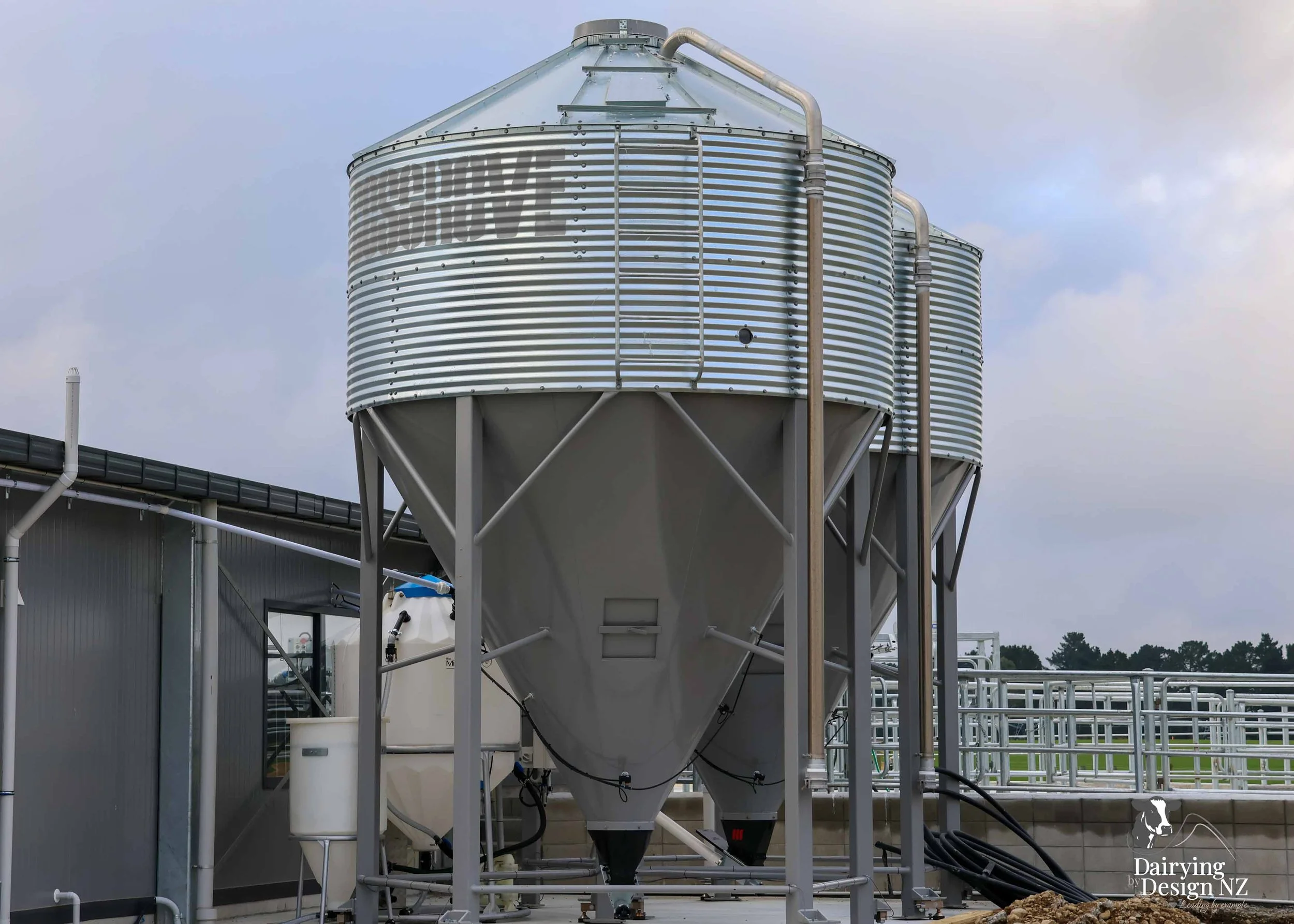  Canterbury rotary dairy shed development designed for efficient milking and cow flow built by Rural Building Solutions, featuring a Donald Engineering Rotary Platform, Earthworks by Densem Contracting 2010 Ltd, Refrigeration by Dairycool, Feed silos