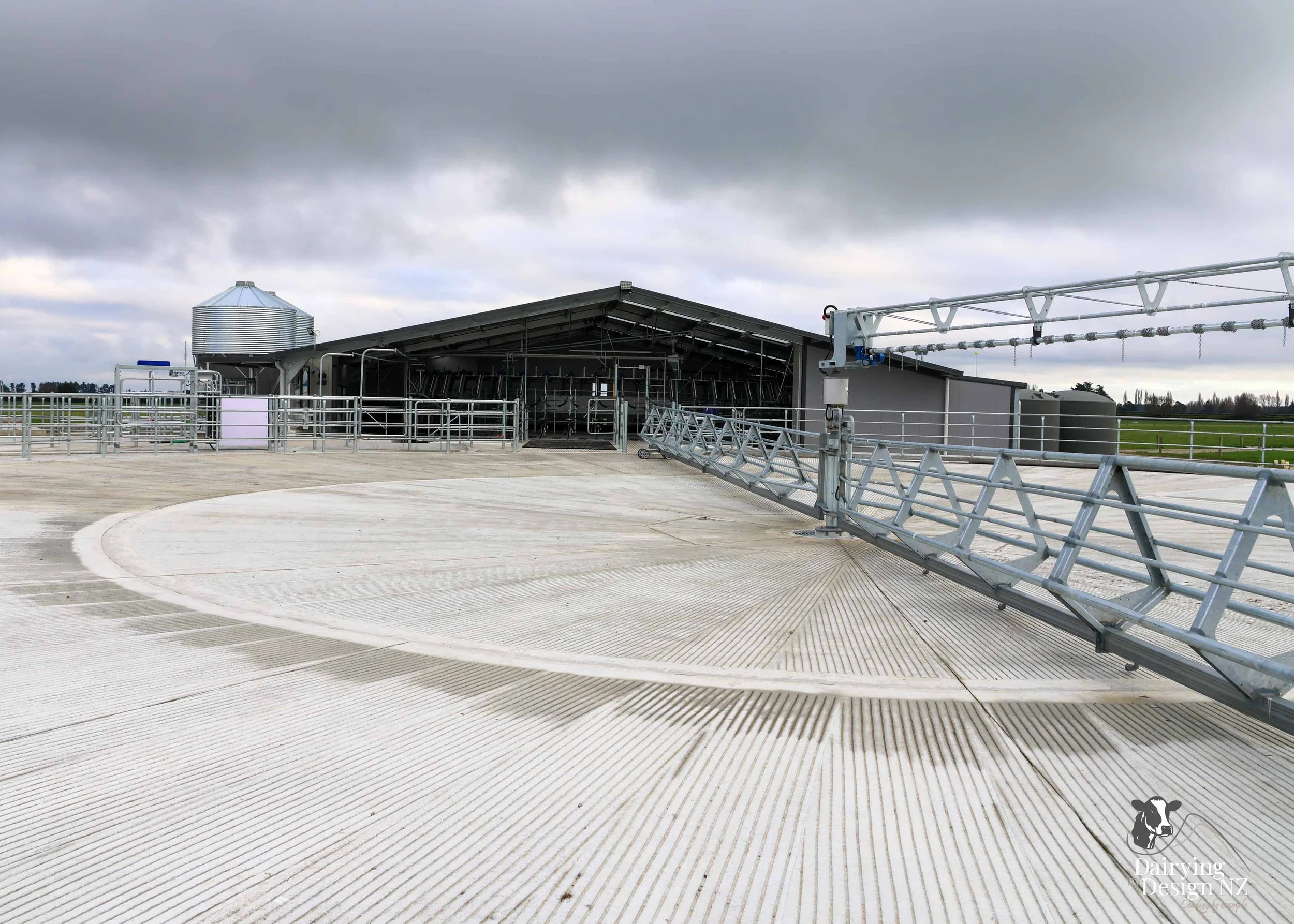  Canterbury rotary dairy shed development designed for efficient milking and cow flow built by Rural Building Solutions, featuring a Donald Engineering Rotary Platform, Earthworks by Densem Contracting 2010 Ltd, Refrigeration by Dairycool, Feed silos