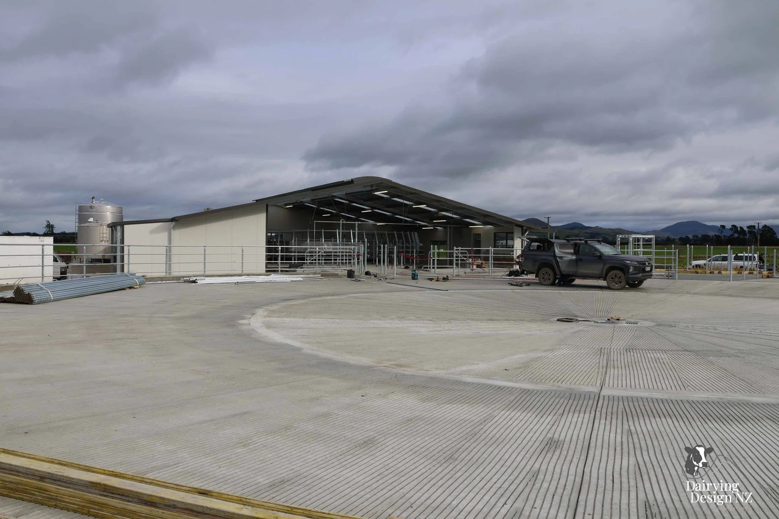  Canterbury rotary dairy shed development designed for efficient milking and cow flow built by Rural Building Solutions, featuring a Donald Engineering Rotary Platform, Earthworks by Densem Contracting 2010 Ltd, Refrigeration by Dairycool, Feed silos
