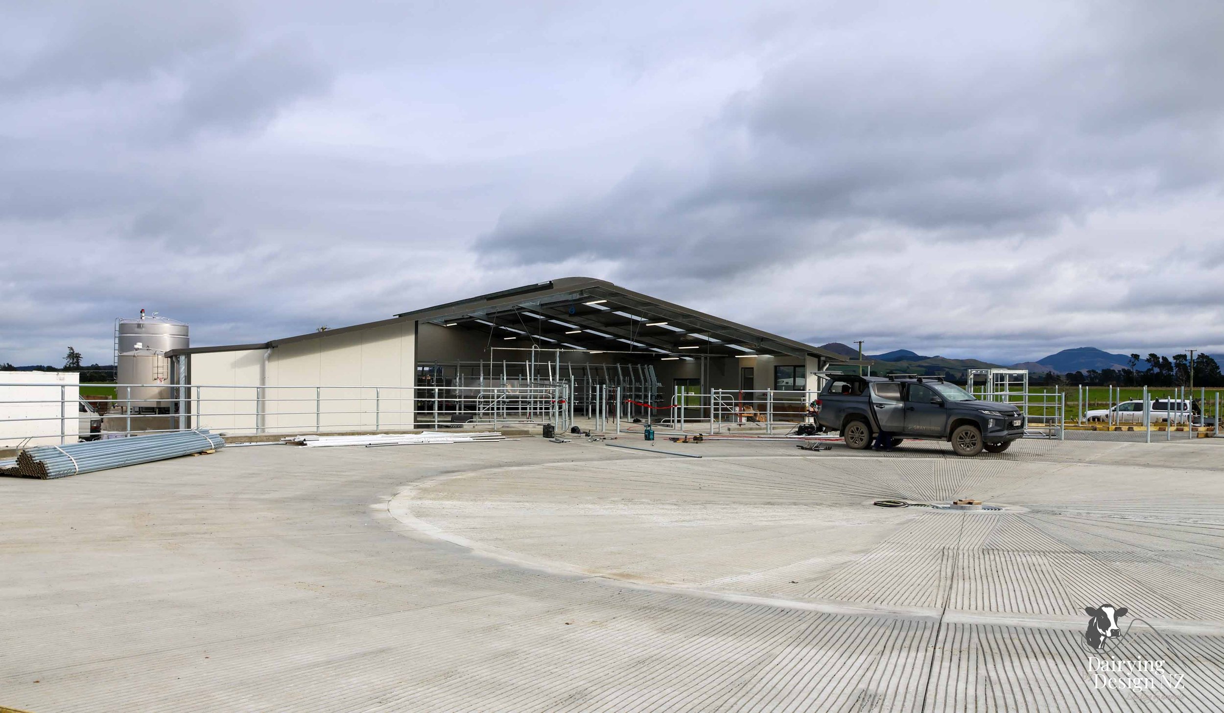 Canterbury rotary dairy shed development designed for efficient milking and cow flow built by Rural Building Solutions, featuring a Donald Engineering Rotary Platform, Earthworks by Densem Contracting 2010 Ltd, Refrigeration by Dairycool, Feed silos