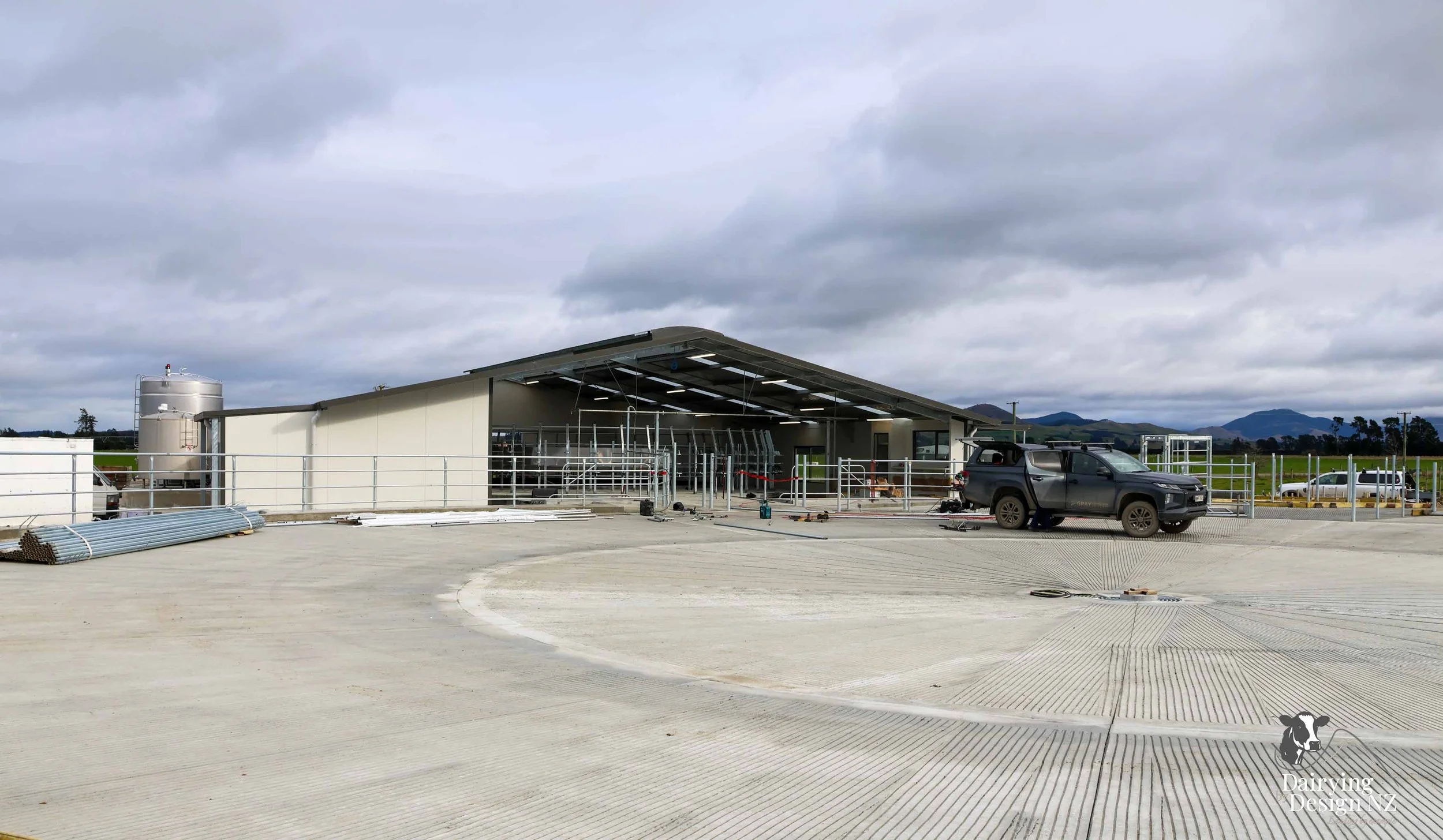  Canterbury rotary dairy shed development designed for efficient milking and cow flow built by Rural Building Solutions, featuring a Donald Engineering Rotary Platform, Earthworks by Densem Contracting 2010 Ltd, Refrigeration by Dairycool, Feed silos