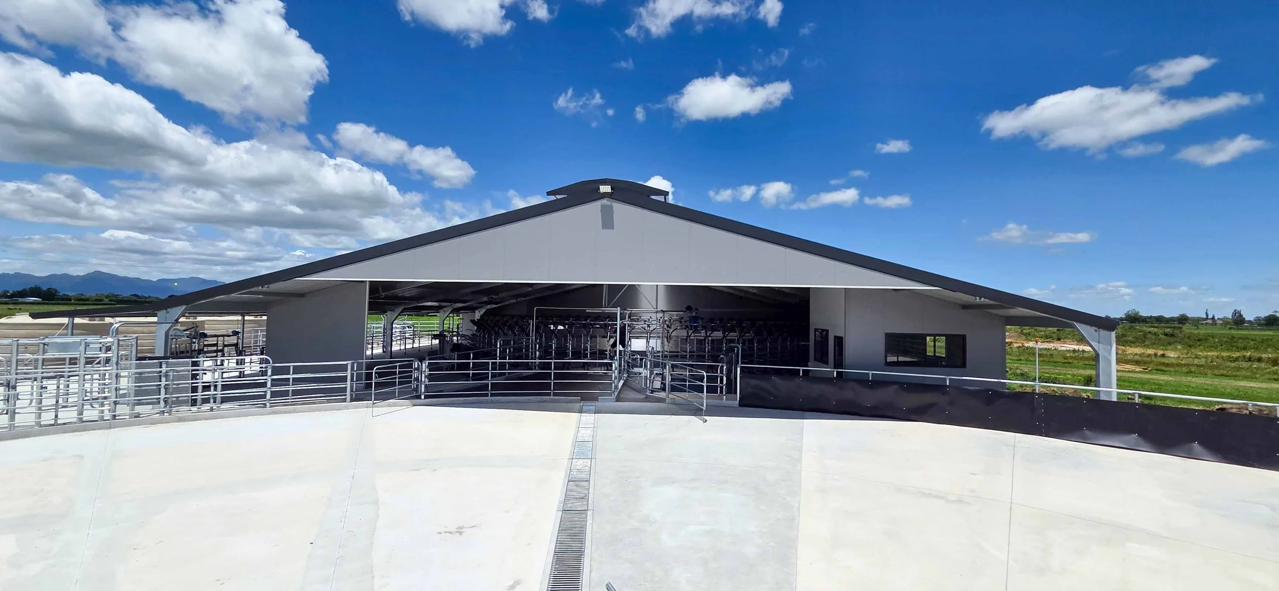  Waikato rotary dairy shed development designed for efficient milking and cow flow built by Don Chapman Waikato Ltd, featuring a Moa Rotary Platform, yard work by Leask Engineering, Earthworks by Waihou Excavation, Electrical work by Electronz, Efflu