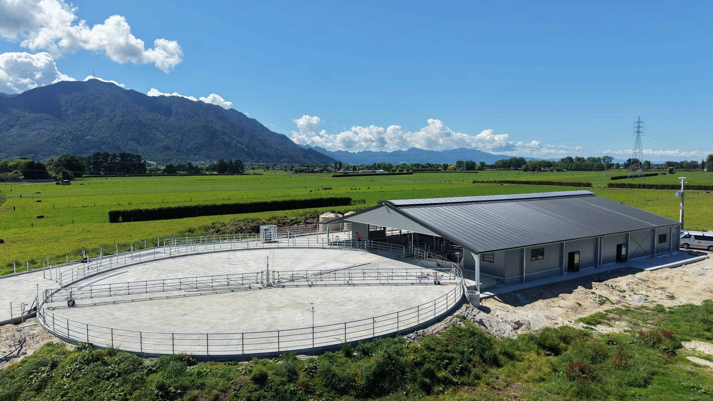  Waikato rotary dairy shed development designed for efficient milking and cow flow built by Don Chapman Waikato Ltd, featuring a Moa Rotary Platform, yard work by Leask Engineering, Earthworks by Waihou Excavation, Electrical work by Electronz, Efflu