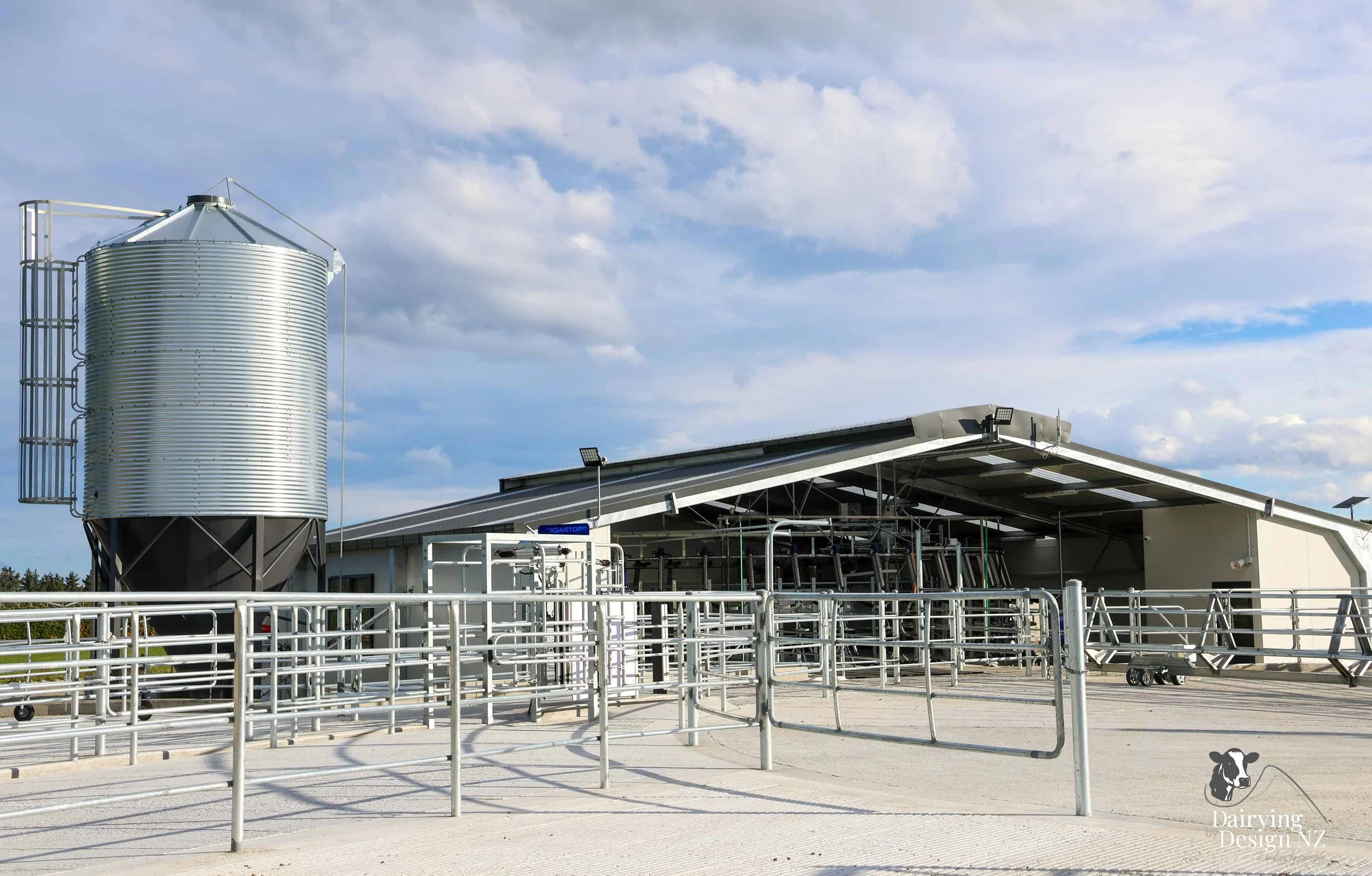  Canterbury rotary dairy shed development designed for efficient milking and cow flow built by Rural Building Solutions, featuring a Donald Engineering Rotary Platform, Earthworks by Densem Contracting 2010 Ltd, Refrigeration by Dairycool, Feed silos