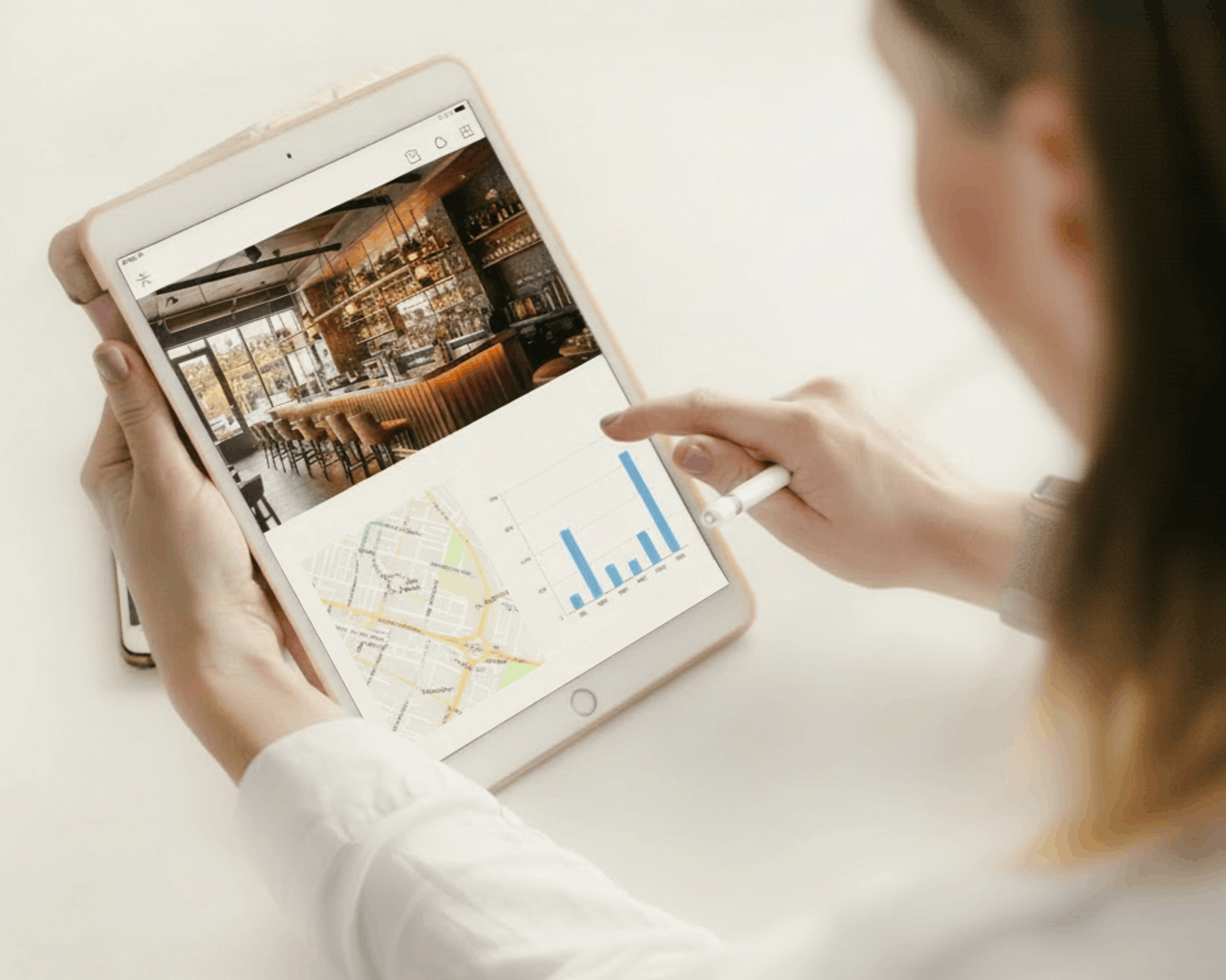 A professional in the beverage industry looking through CRM data on a restaurant