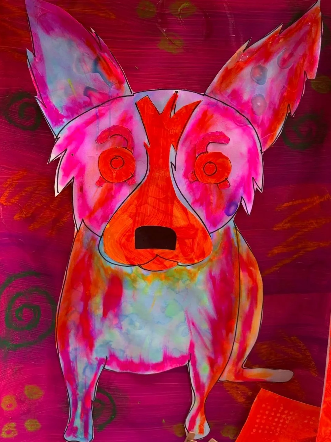 Colorful, abstract drawing of a dog's face with large ears on a vibrant background.