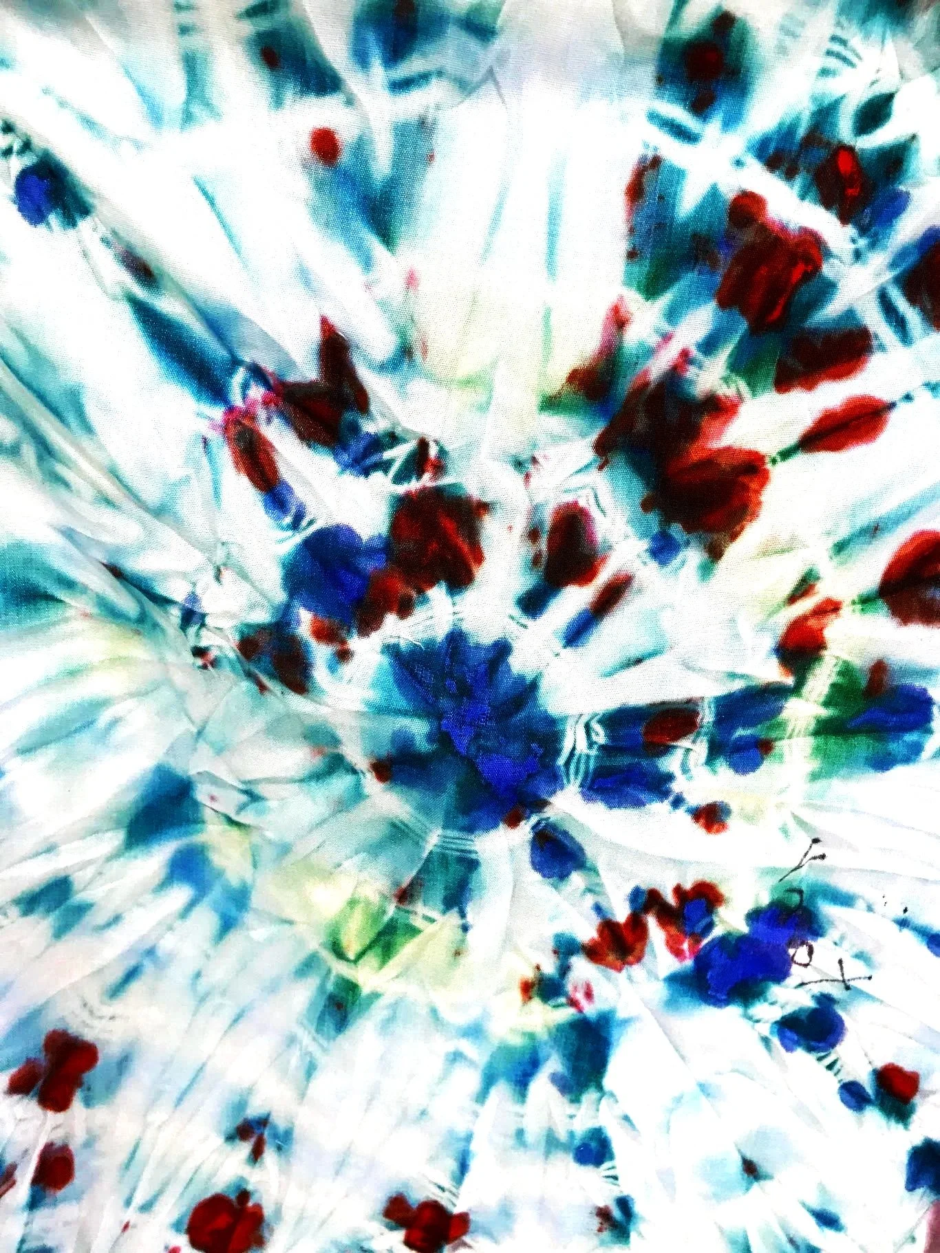 Abstract watercolor painting with red and blue splashes, and light blue and white background.