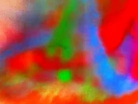 Abstract blur of bright colors including red, green, blue, and orange, with no discernible objects.