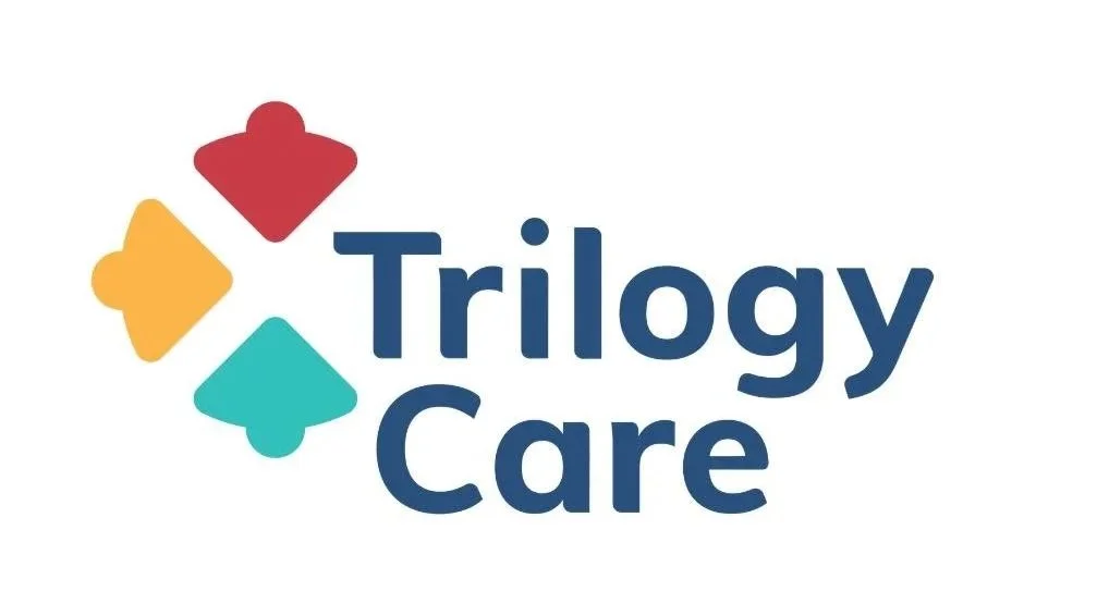 Logo with four colored hearts and the text "Trilogy Care".