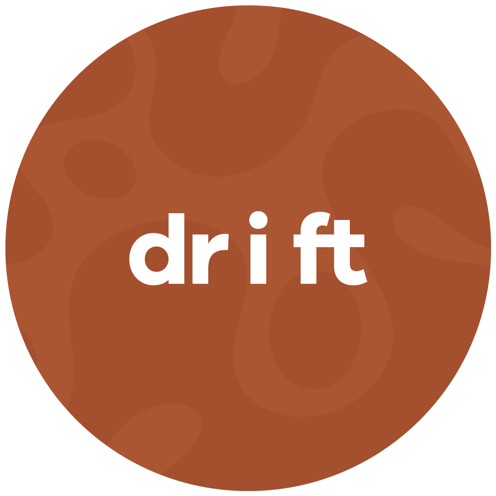 A circular brown drag coin with a marbled pattern, featuring the word 'drift' in white lowercase letters