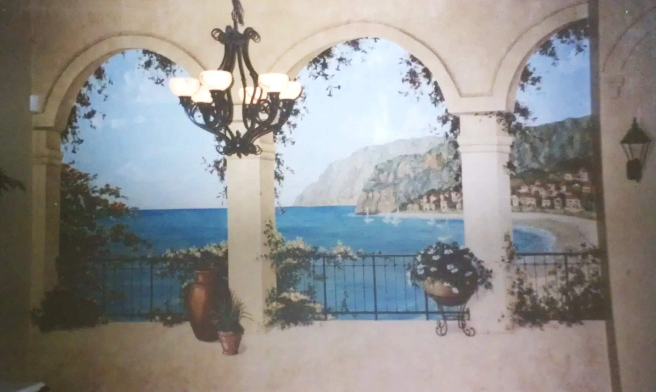 Residential dining room mural of the coast of Italy.