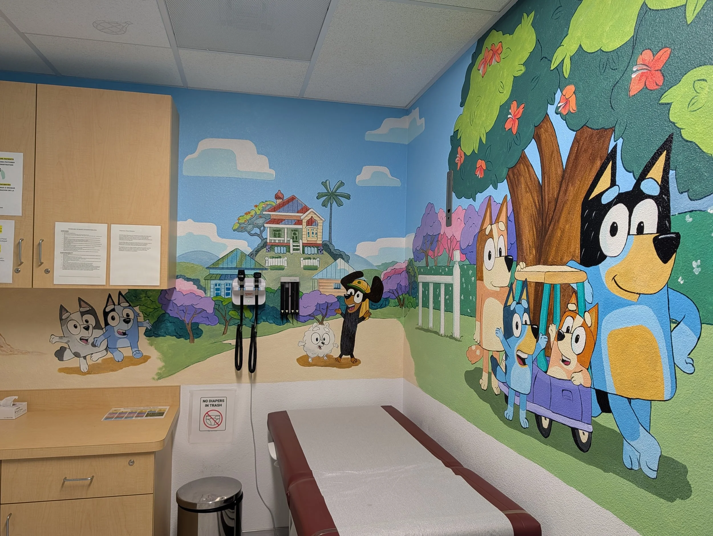 Bluey exam room with their Home, Snickers, Pom Pom, Socks and Muffin.