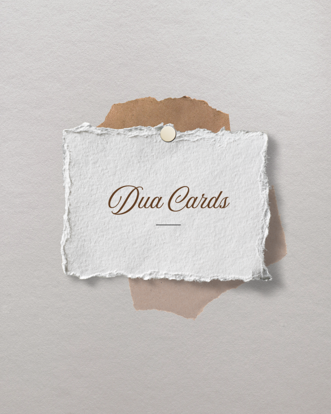A piece of white paper with torn edges that reads 'Dua Cards' in elegant brown script, attached to a beige and brown torn paper background with a small round white pin.