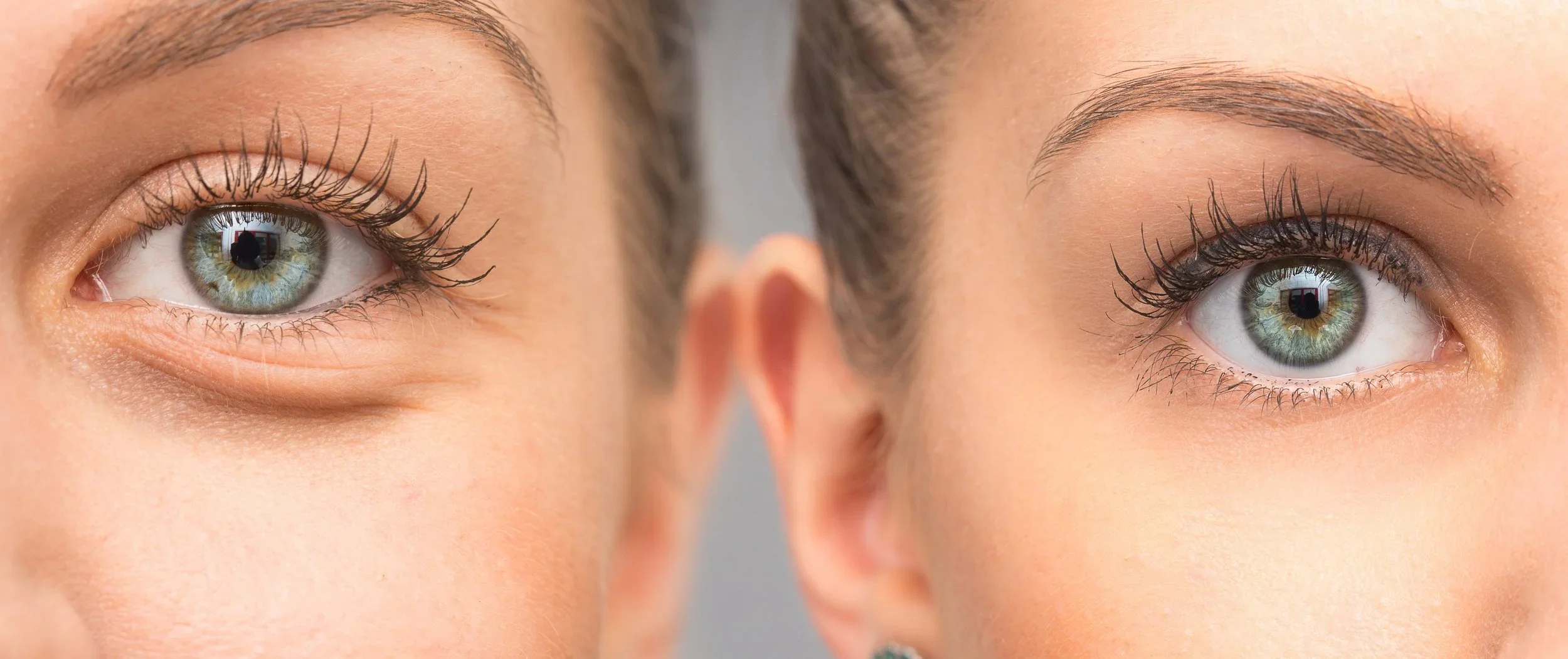 Close-up of two women's eyes with natural makeup and greenish-blue irises at ILUMA Medical Spa in Monrovia.