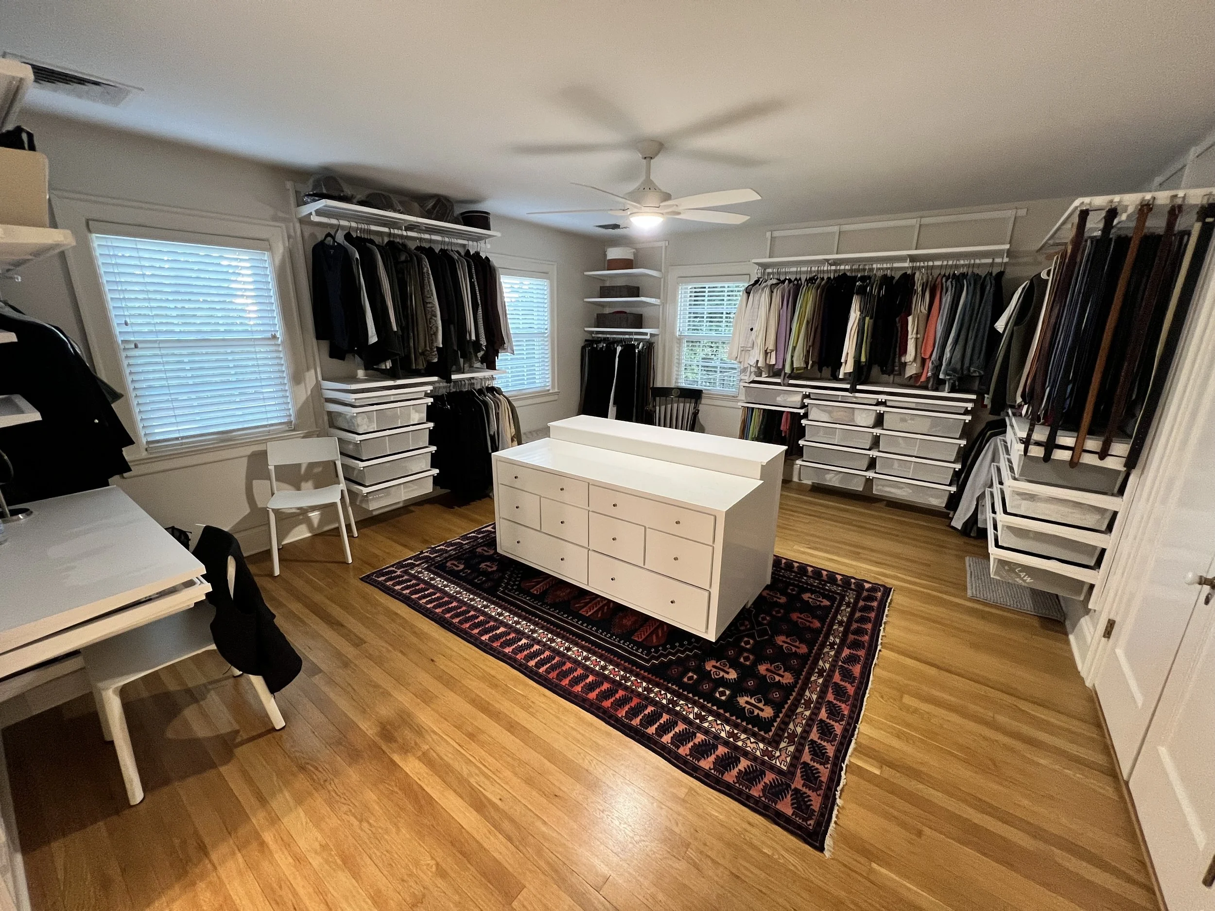 organized closet with bins by neat quarters