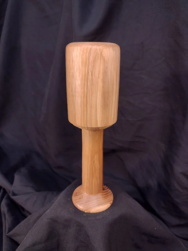 A wooden mallet.