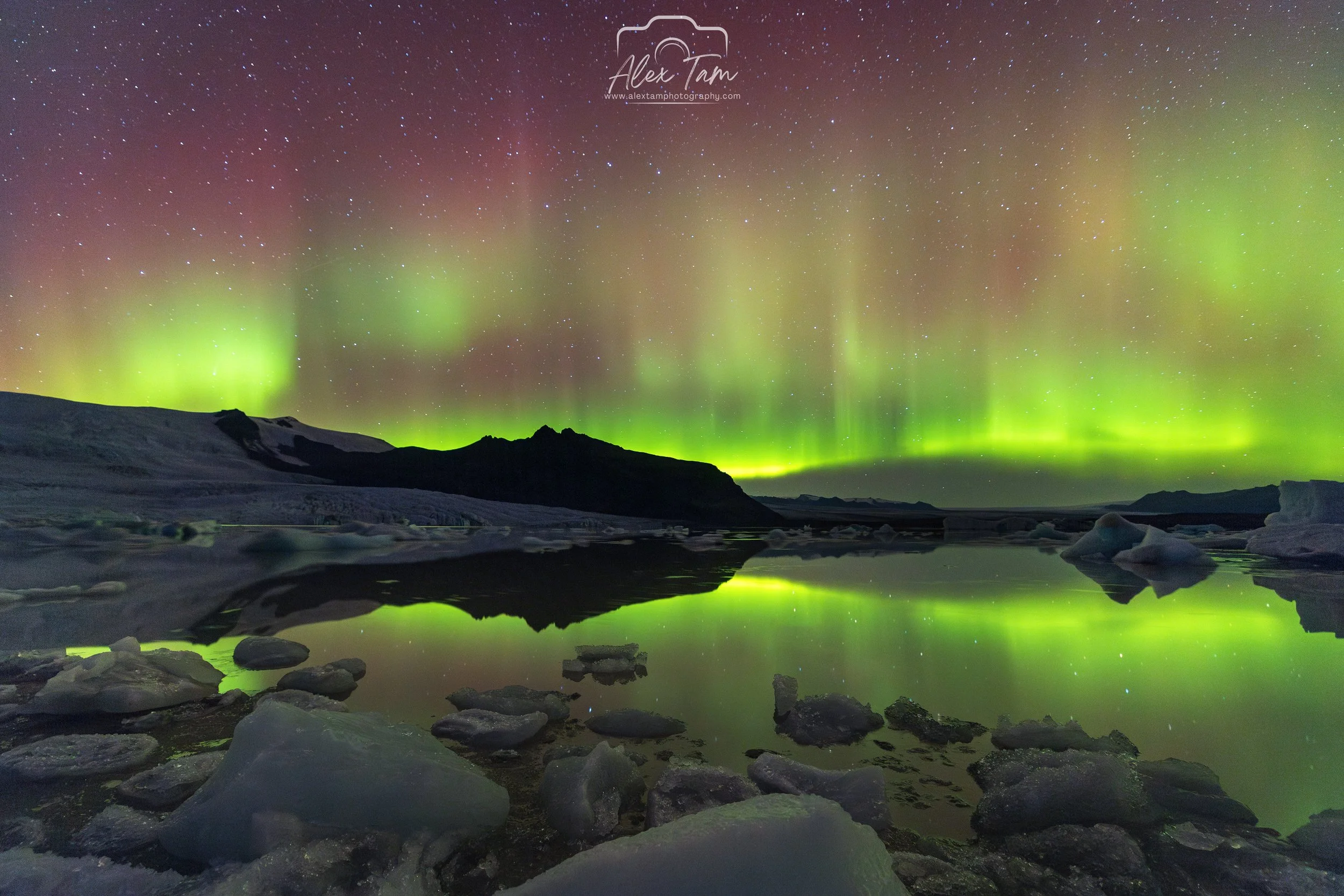 Aurora reflection at glacier lake