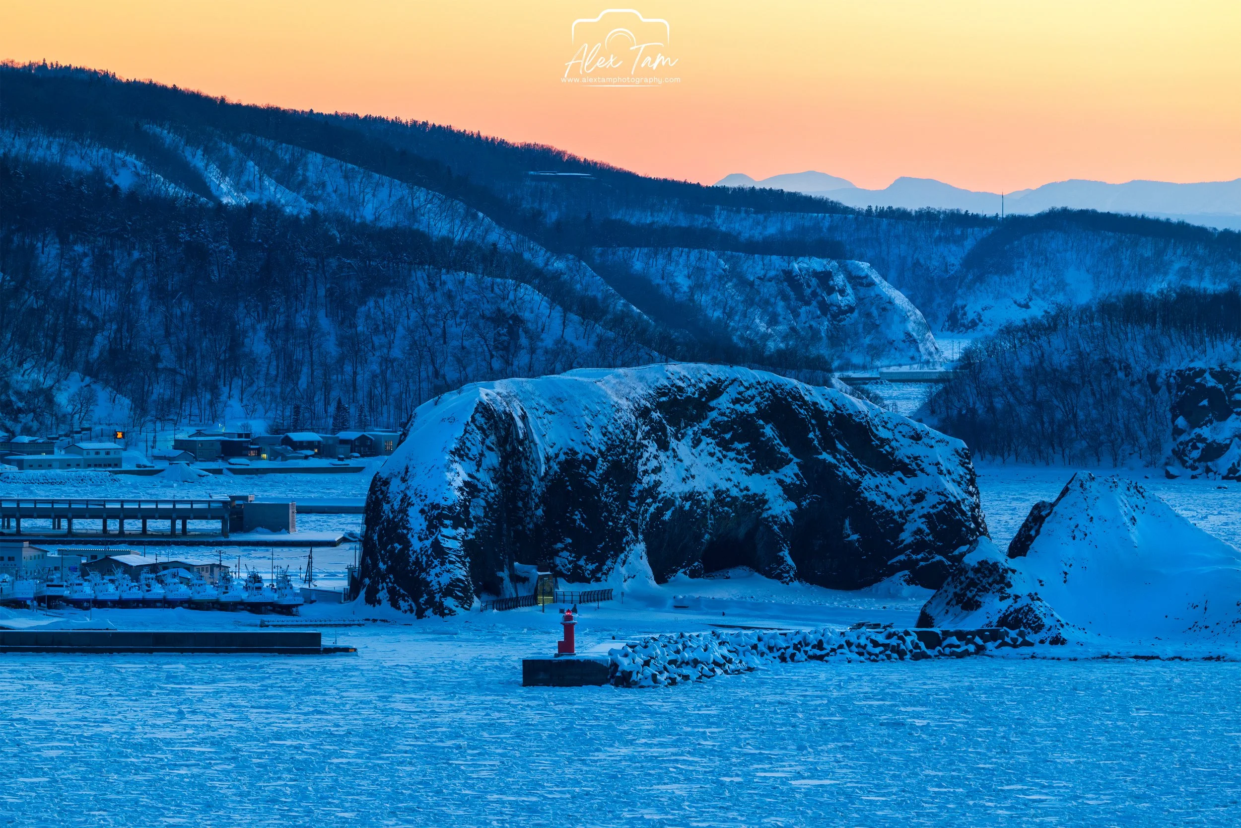 Drift ice fills the harbor