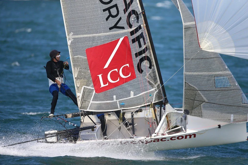 sending it - lcc asia pacific 12 foot skiff in action