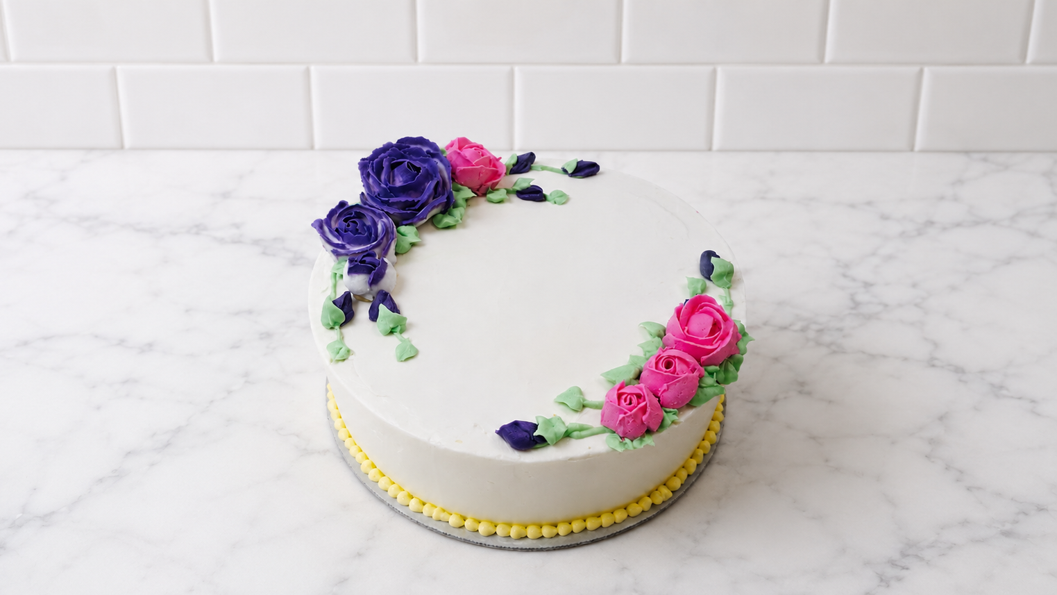 white almond buttercream floral spray cake