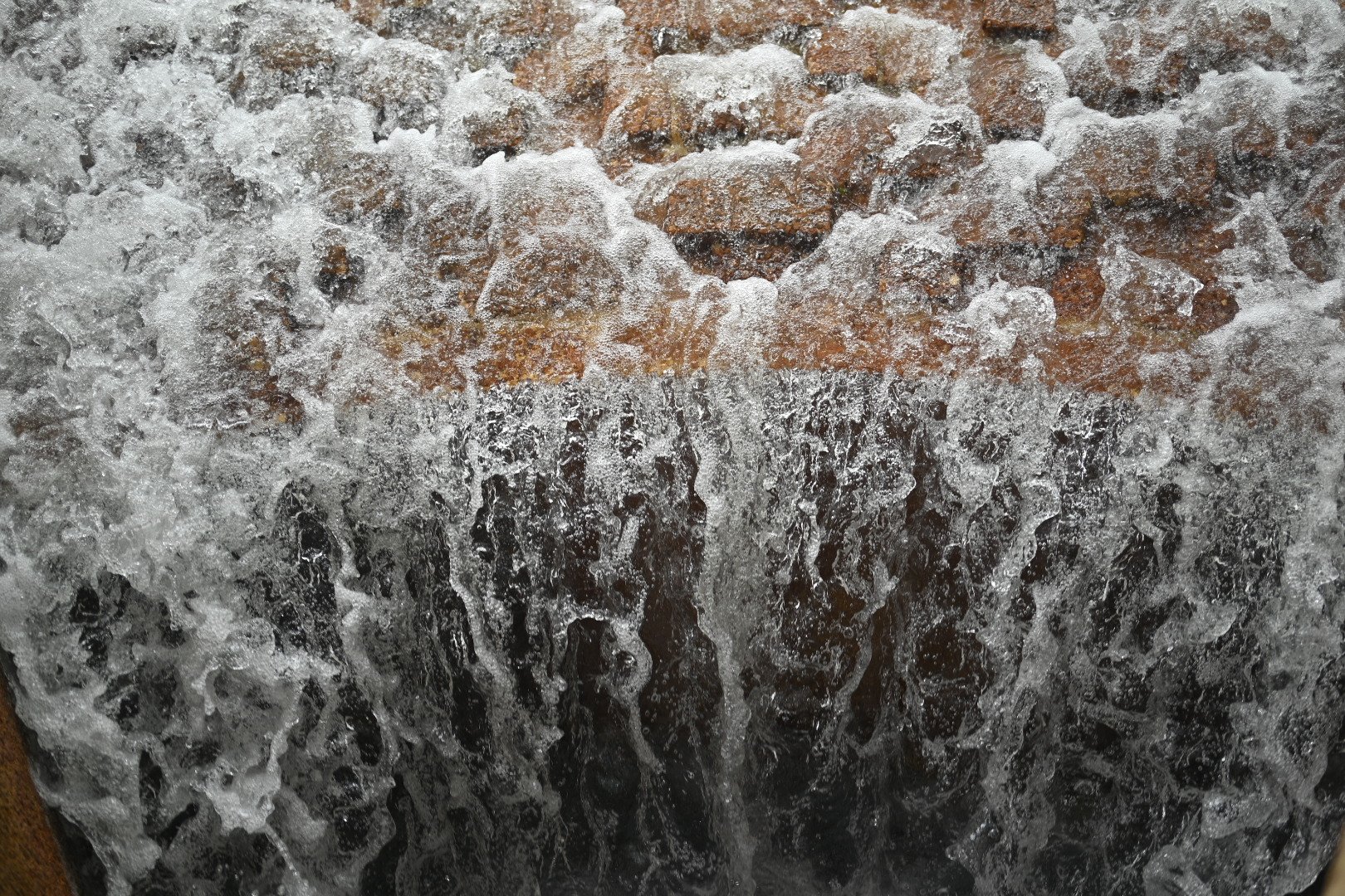 Candle In A Waterfall