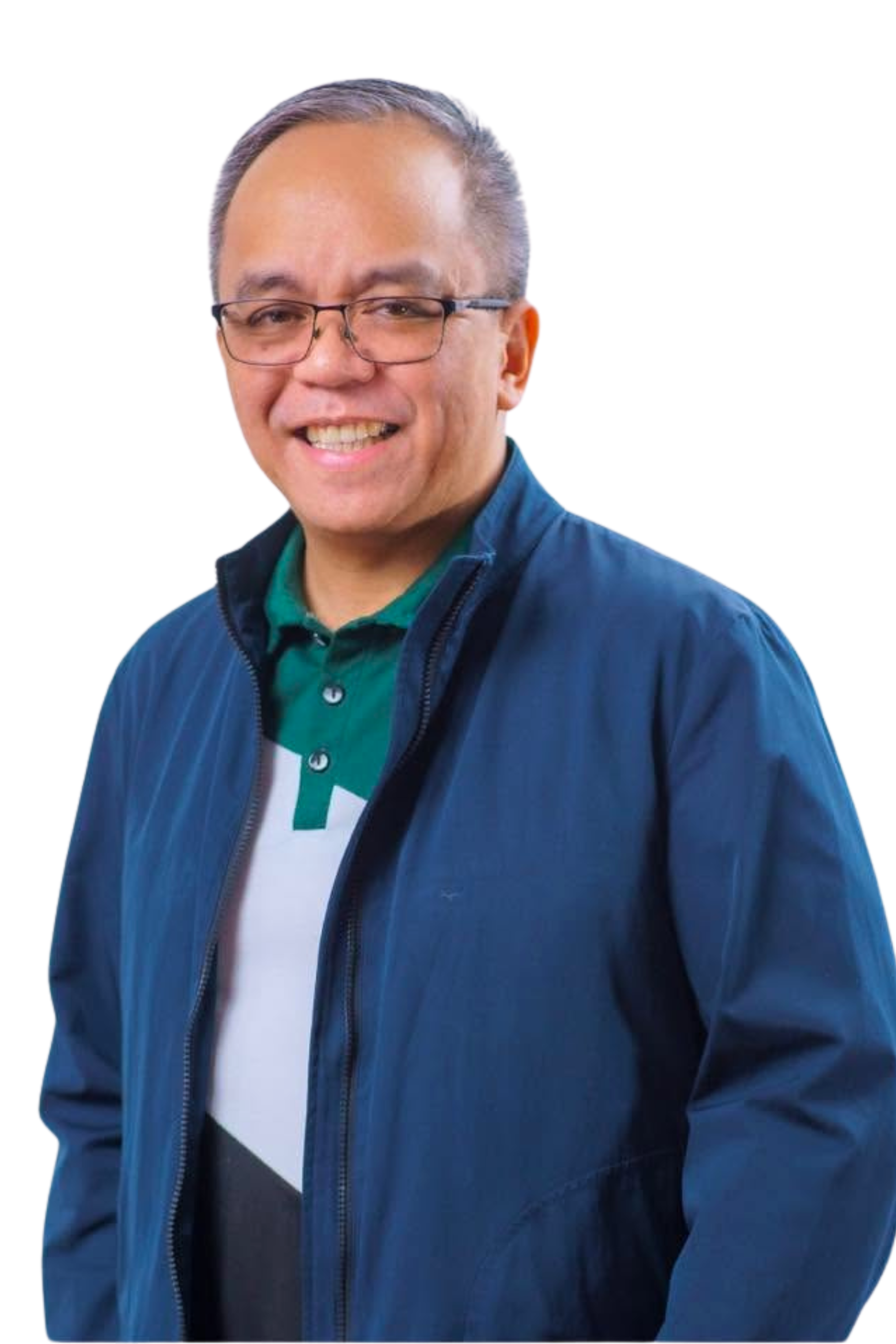 A smiling man with glasses wearing a blue jacket over a green and white polo shirt.
