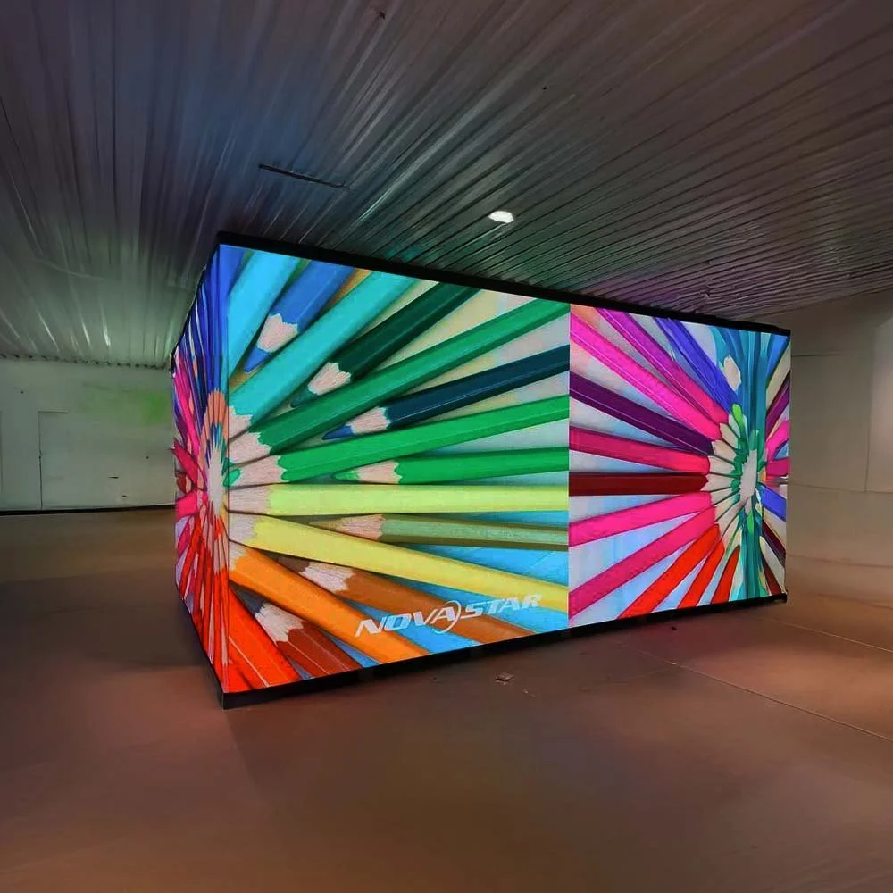 Large digital display featuring colorful pencils arranged in a circular pattern, with the words 'NOVA STAR' written on the lower left corner.