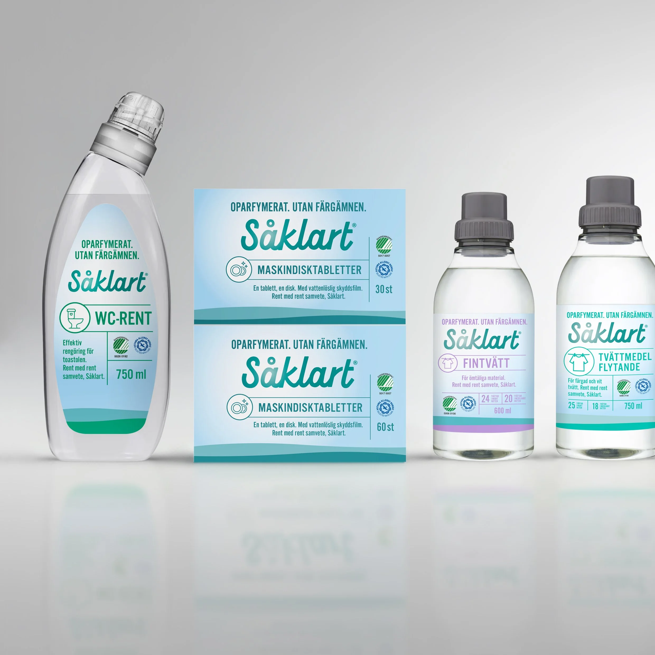 Collection of cleaning products and disinfectant tablets from the brand Saklart, including toilet cleaner, dishwashing tablets, fabric whitener, and bathroom cleaner, displayed against a plain gray background.