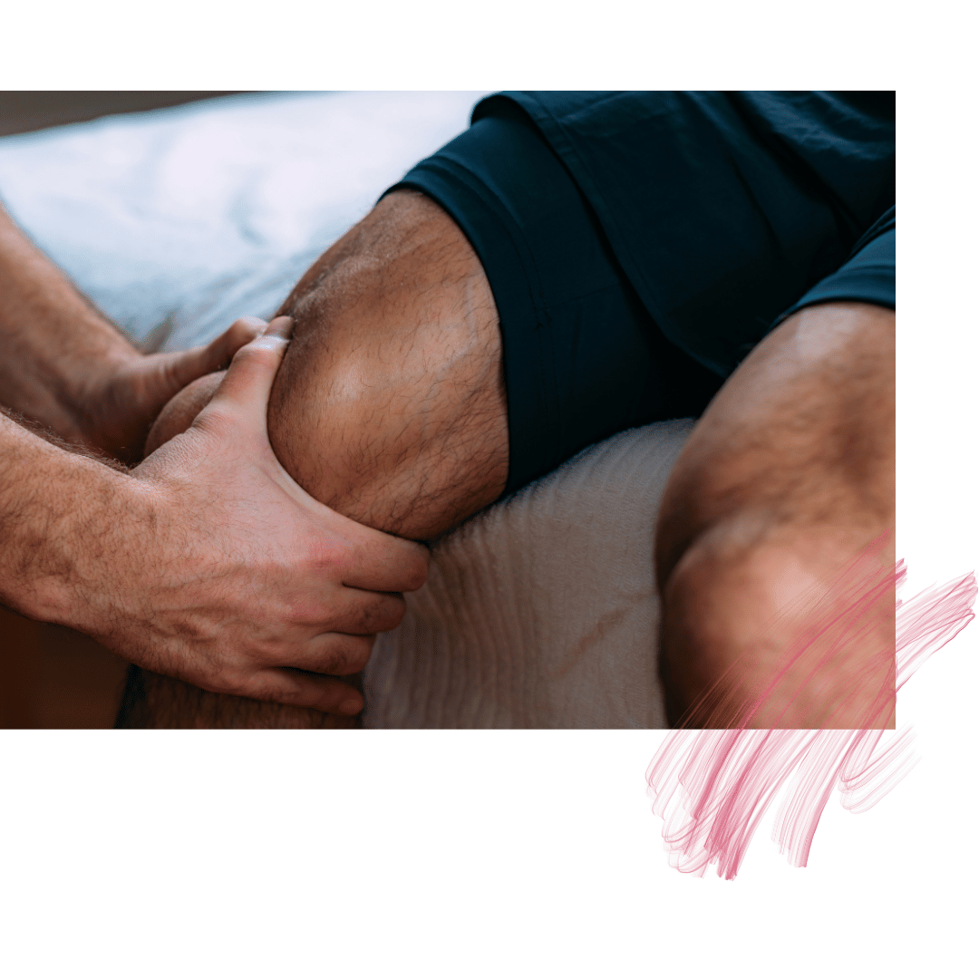 Massage therapist applying manual pressure to a client's knee