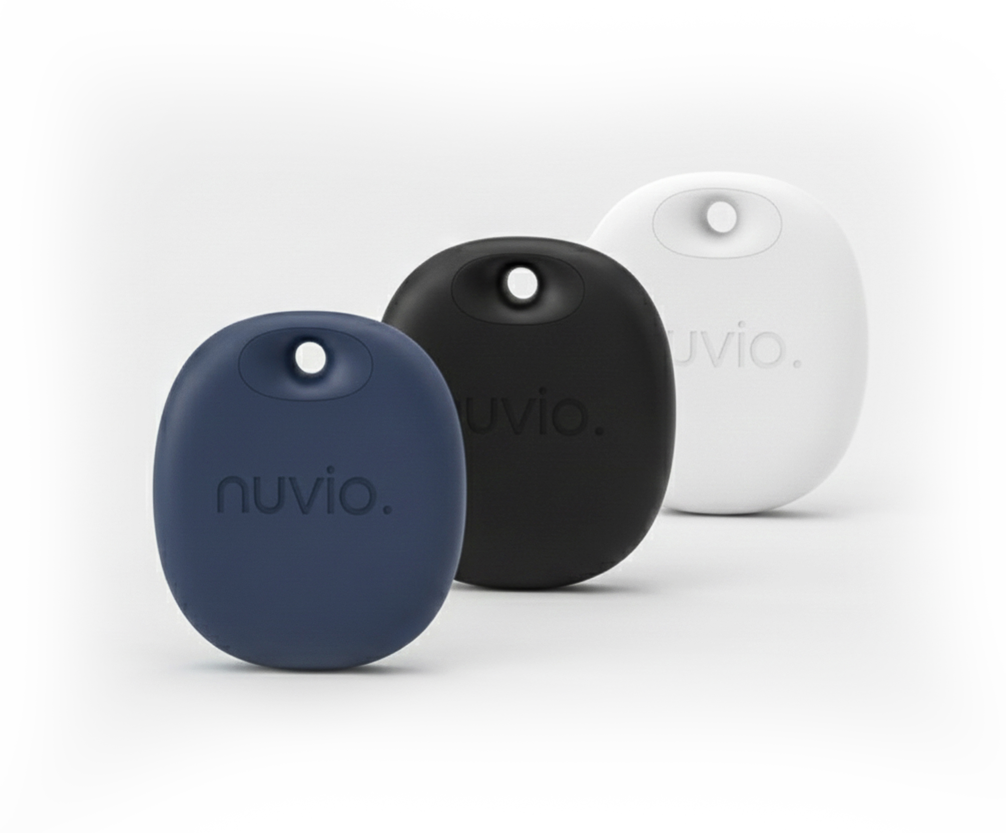 Nuvio TraxTag smart trackers in estate blue, black, and white with a circular keyring loop.