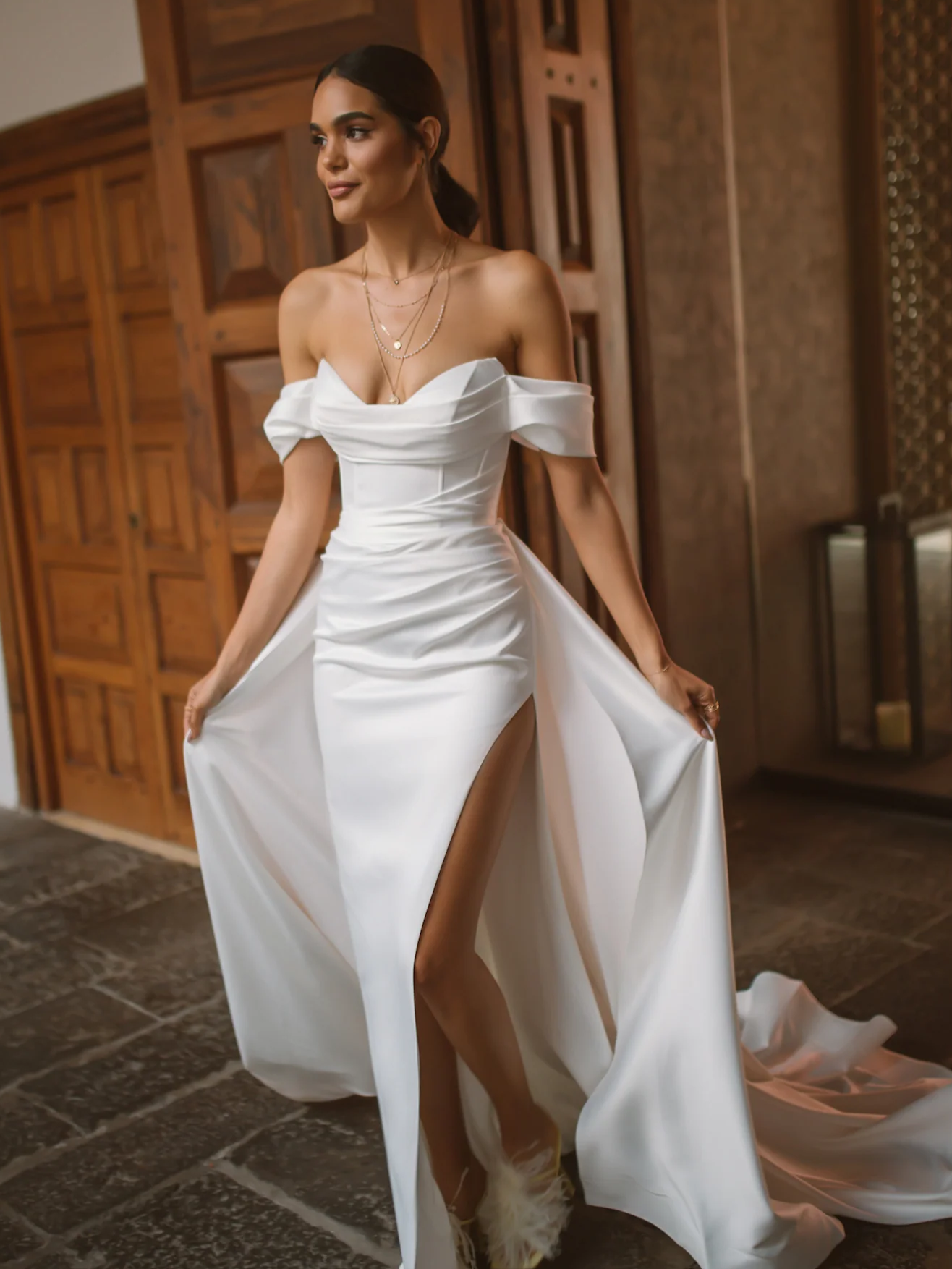 white wedding gown with a high slit